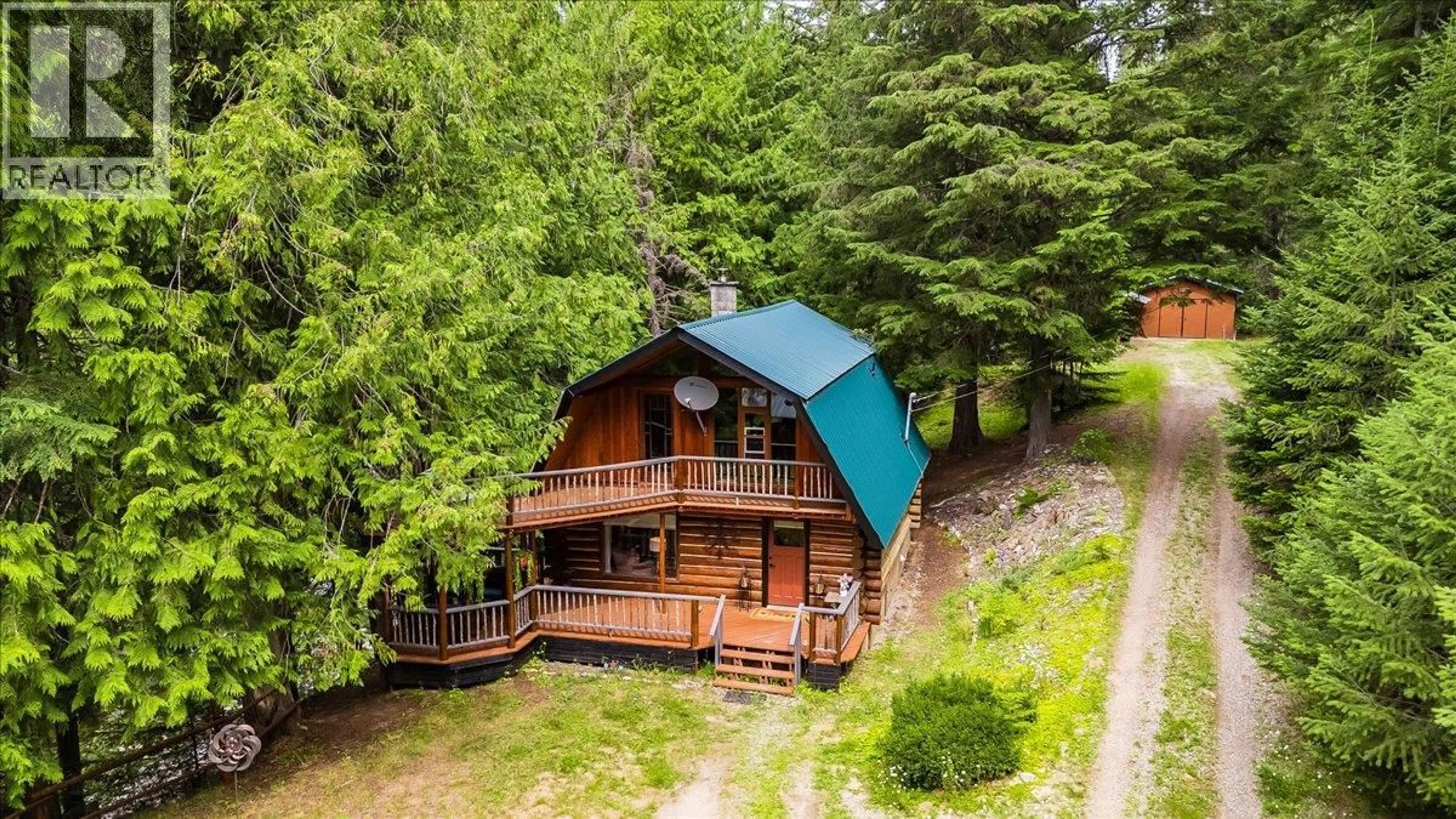 A pic from outside/outdoor area/front of a property/back of a property/a pic from drone, unknown for 550 2ND RELIEF ROAD, Salmo British Columbia V0G1Z0