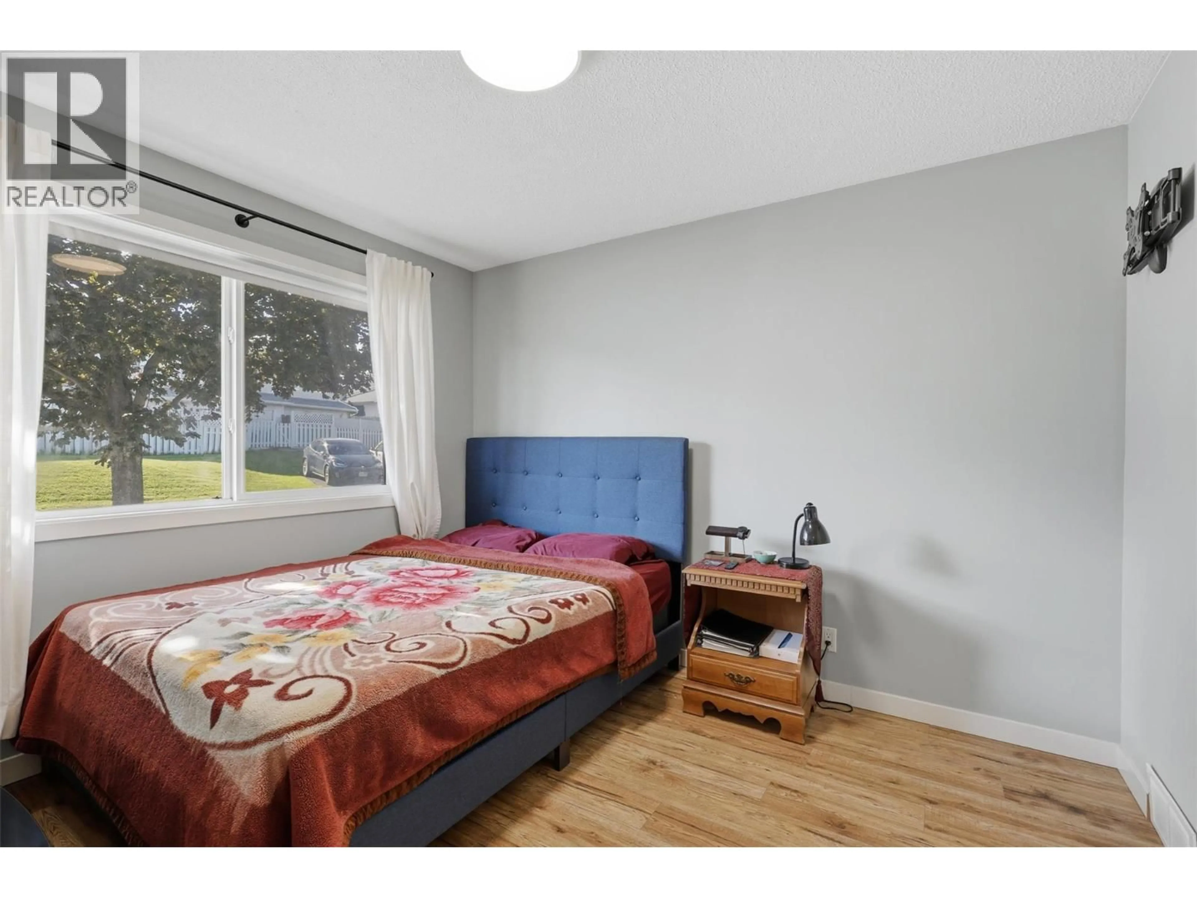 Bedroom with bed, wood/laminate floor for 309 - 1780 SPRINGVIEW PLACE, Kamloops British Columbia V2E1C8