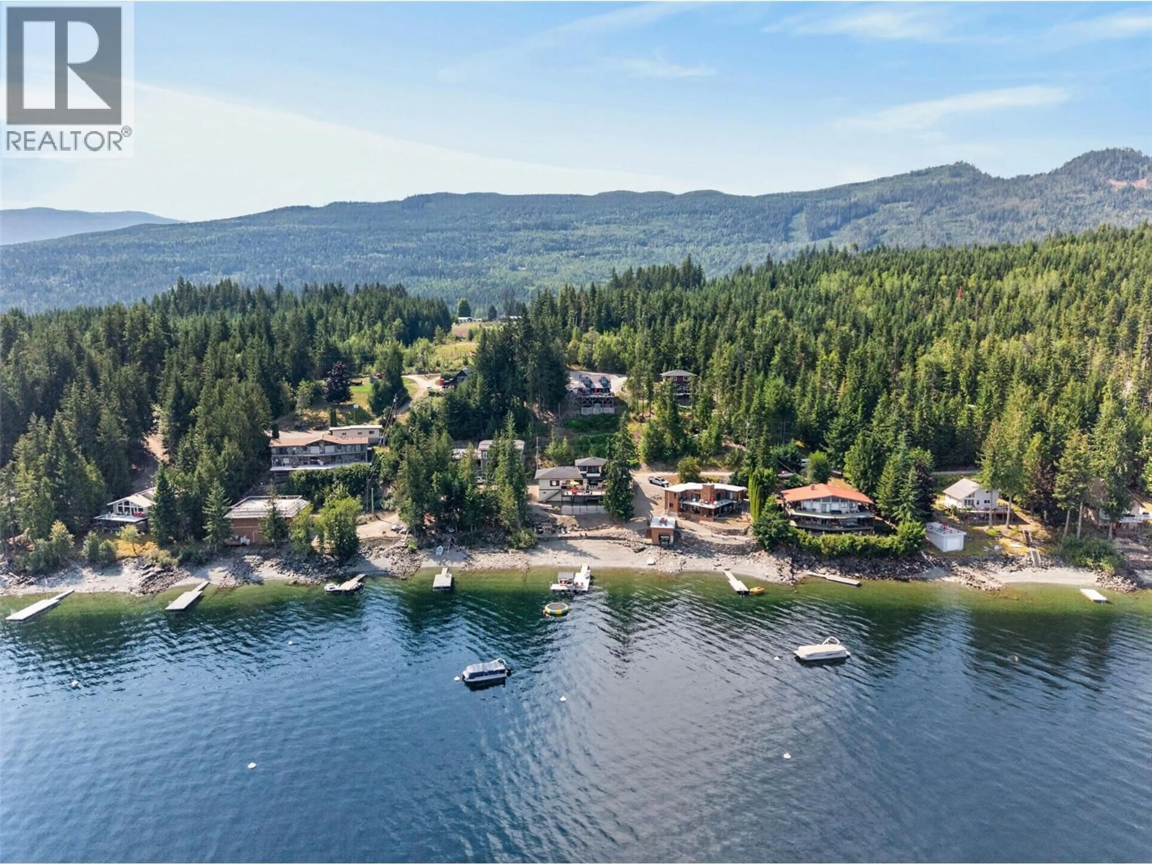 A pic from outside/outdoor area/front of a property/back of a property/a pic from drone, water/lake/river/ocean view for 12 - 4119 GALLIGAN ROAD, Eagle Bay British Columbia V0E1T0