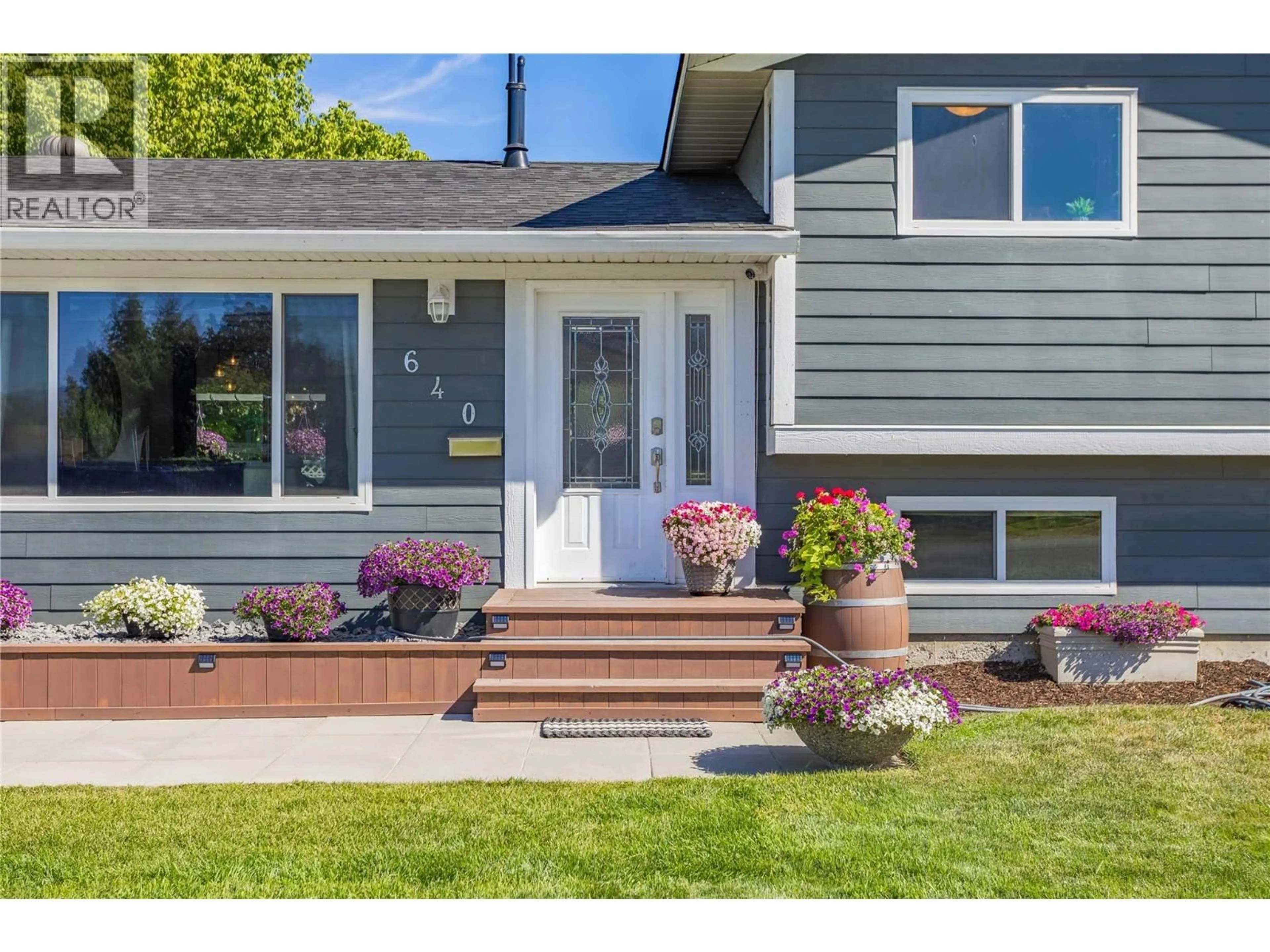 Home with vinyl exterior material, street for 640 MYRON ROAD, Kelowna British Columbia V1X6V3