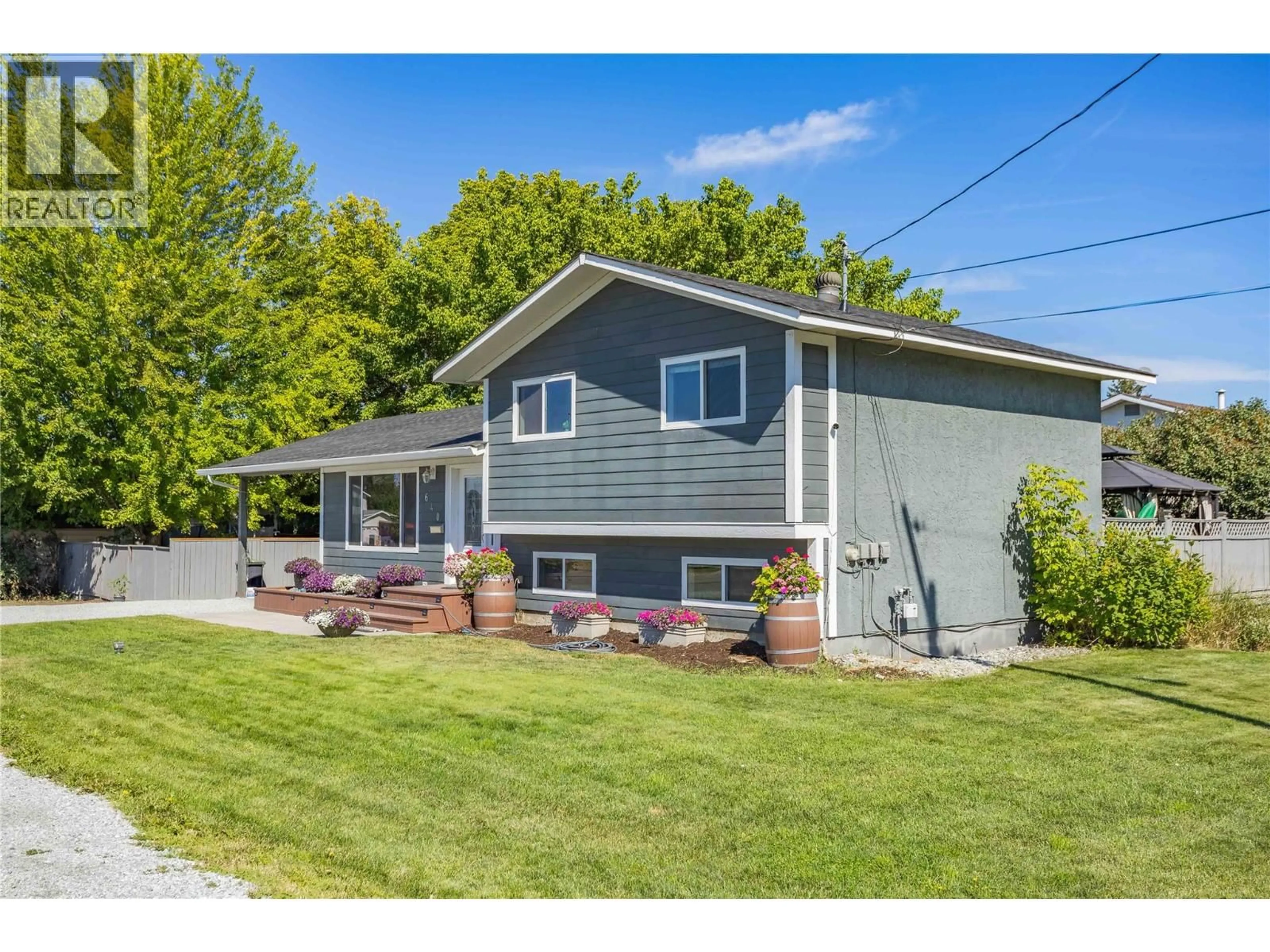 Home with vinyl exterior material, street for 640 MYRON ROAD, Kelowna British Columbia V1X6V3