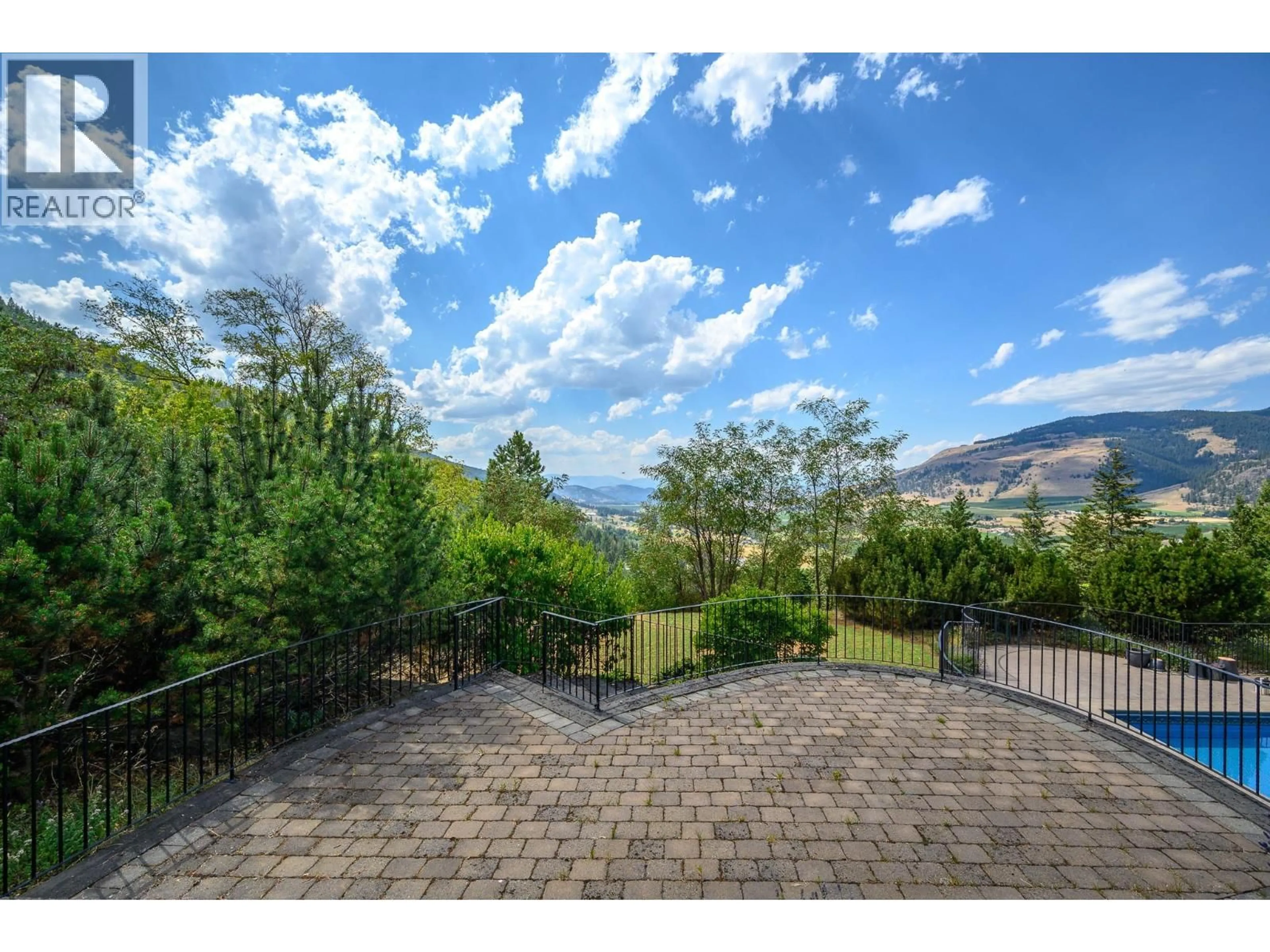 A pic from outside/outdoor area/front of a property/back of a property/a pic from drone, mountain view for 3006 COACHWOOD CRESCENT, Coldstream British Columbia V1B3Y4