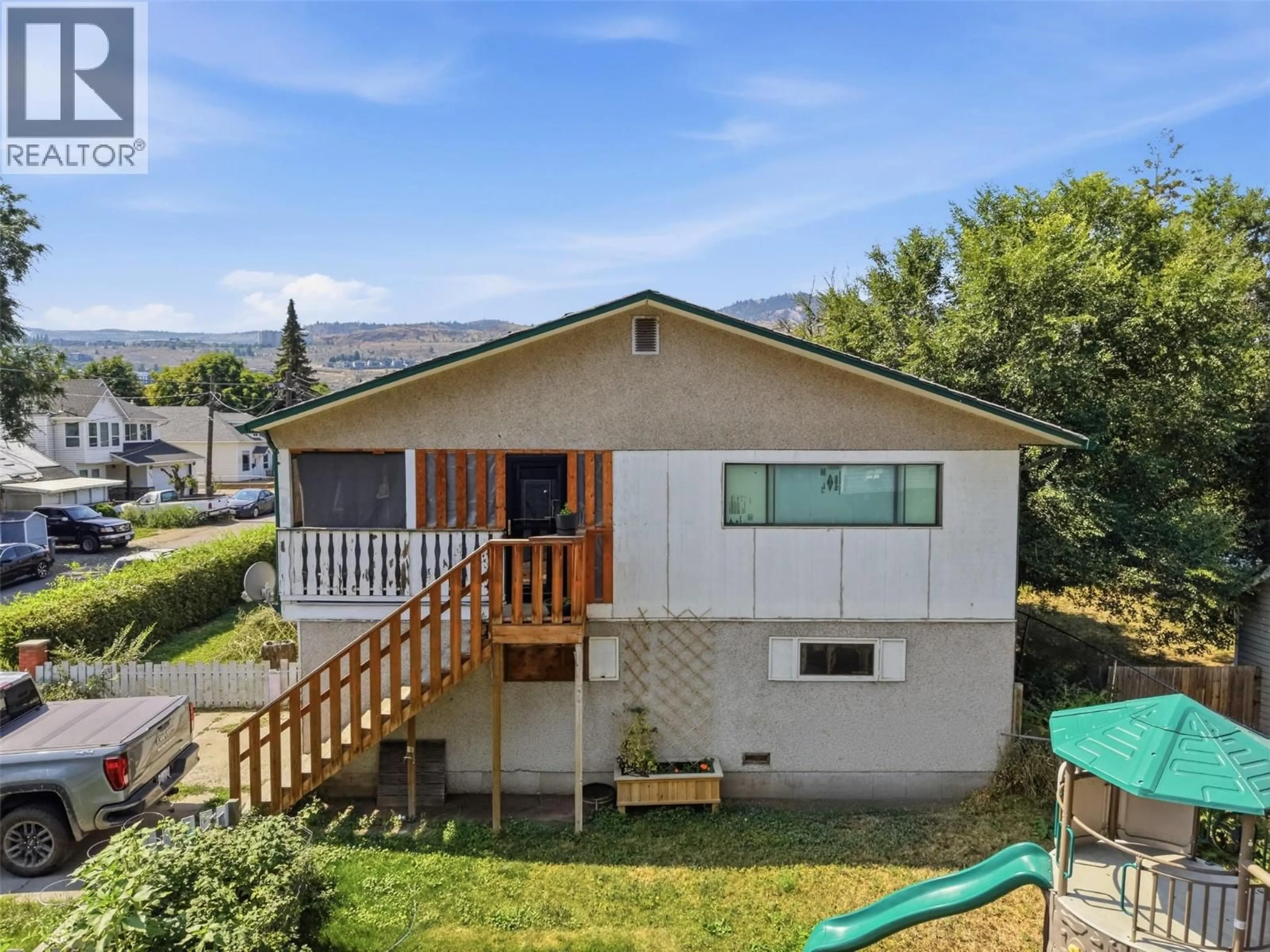 A pic from outside/outdoor area/front of a property/back of a property/a pic from drone, mountain view for 112 WILLIAMS STREET, Kamloops British Columbia V2B3Z6