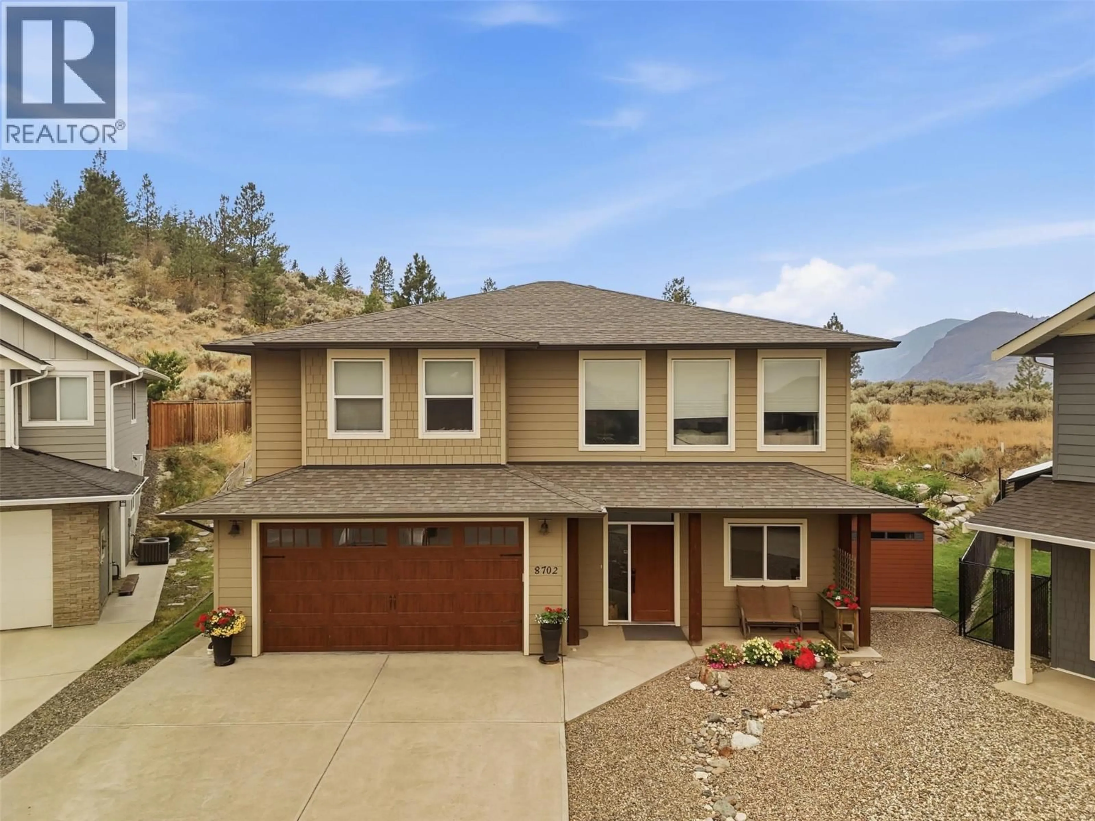 Home with vinyl exterior material, mountain view for 8702 BADGER DRIVE, Kamloops British Columbia V2C0B2