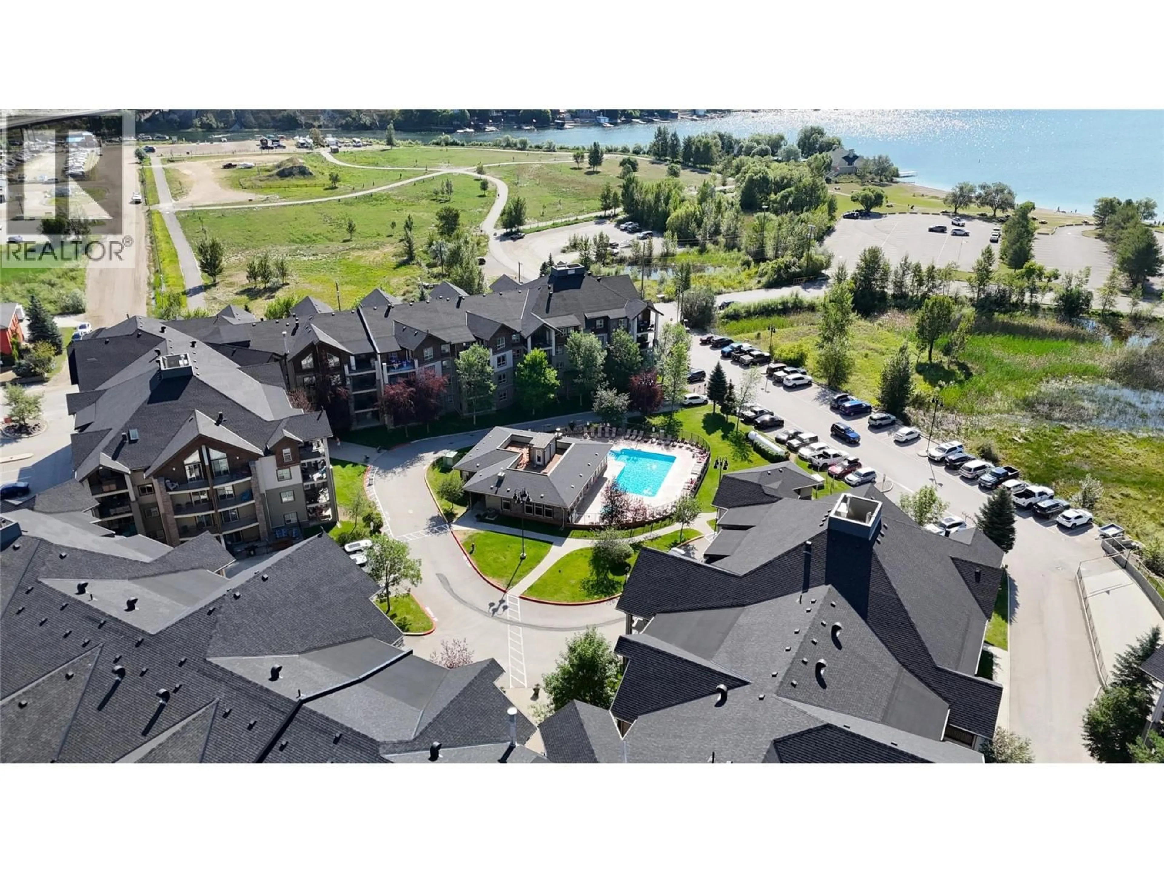 A pic from outside/outdoor area/front of a property/back of a property/a pic from drone, water/lake/river/ocean view for 1403 - 205 THIRD AVENUE, Invermere British Columbia V0A1K7