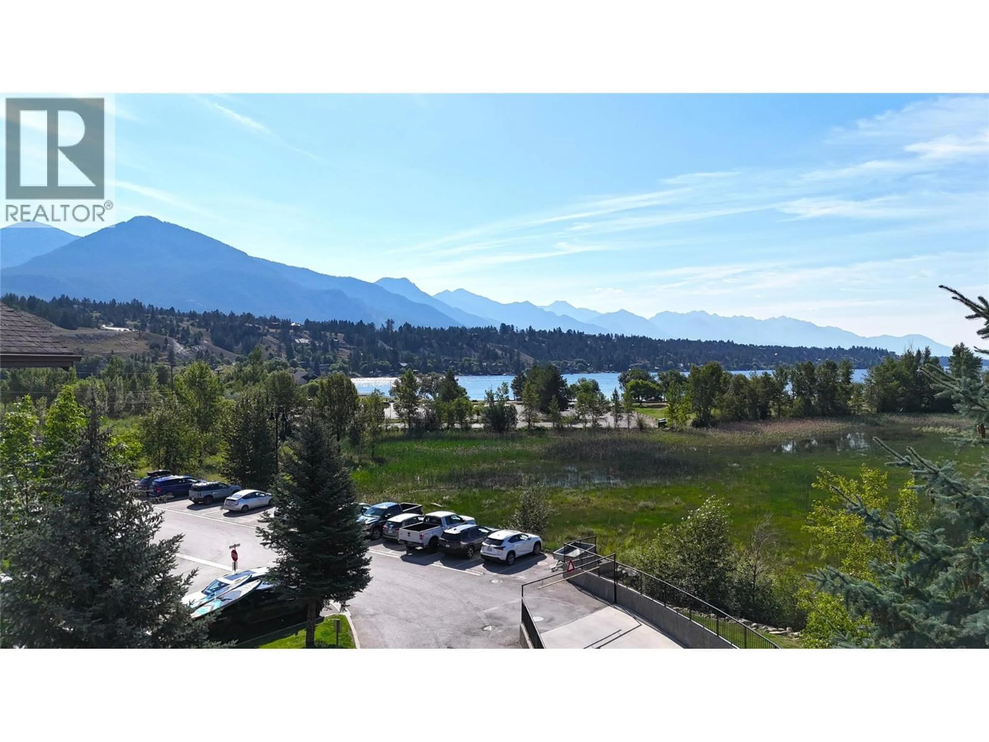 A pic from outside/outdoor area/front of a property/back of a property/a pic from drone, water/lake/river/ocean view for 1403 - 205 THIRD AVENUE, Invermere British Columbia V0A1K7