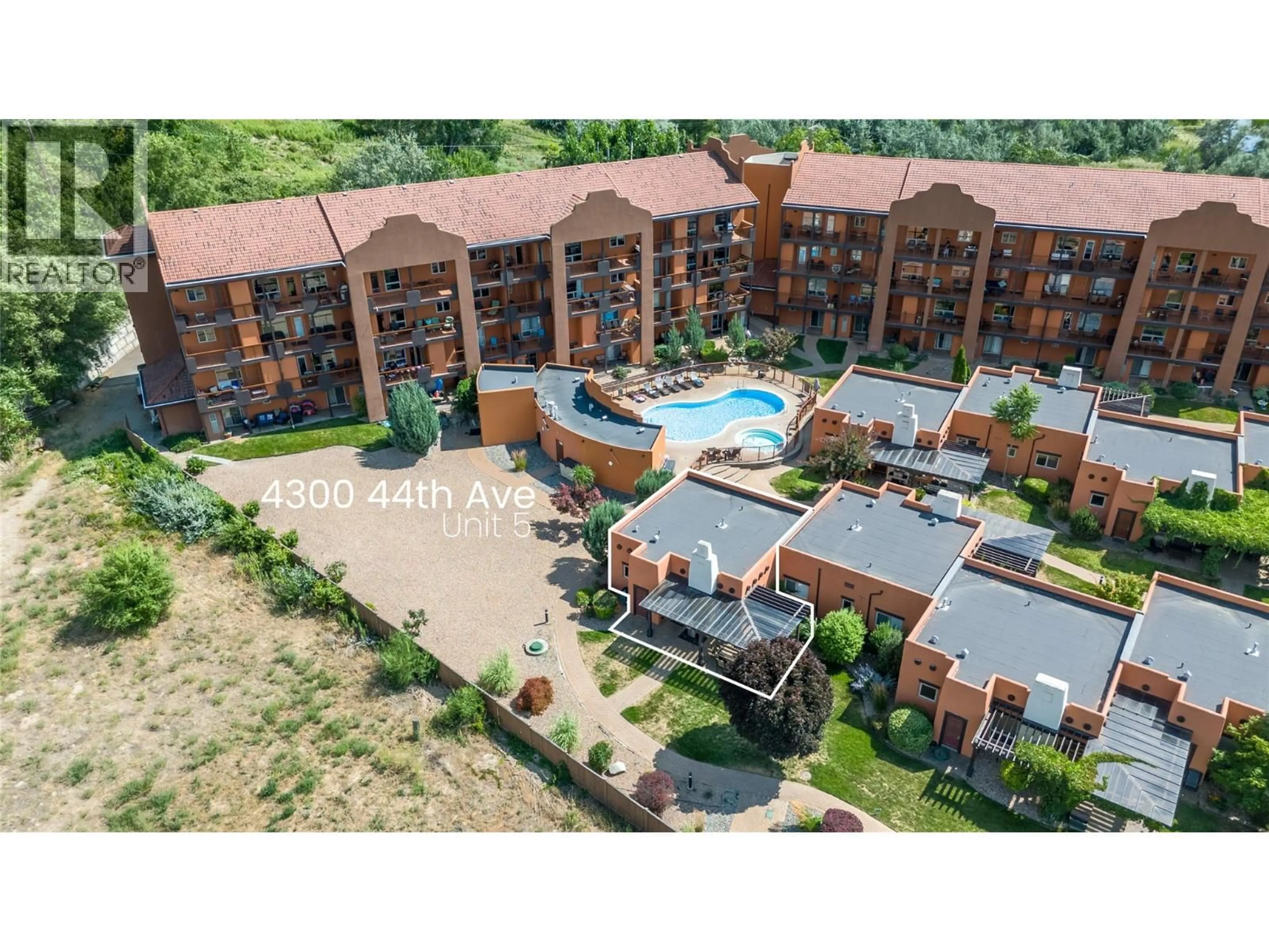 A pic from outside/outdoor area/front of a property/back of a property/a pic from drone, mountain view for 5 - 4300 44TH AVENUE, Osoyoos British Columbia V0H1V6