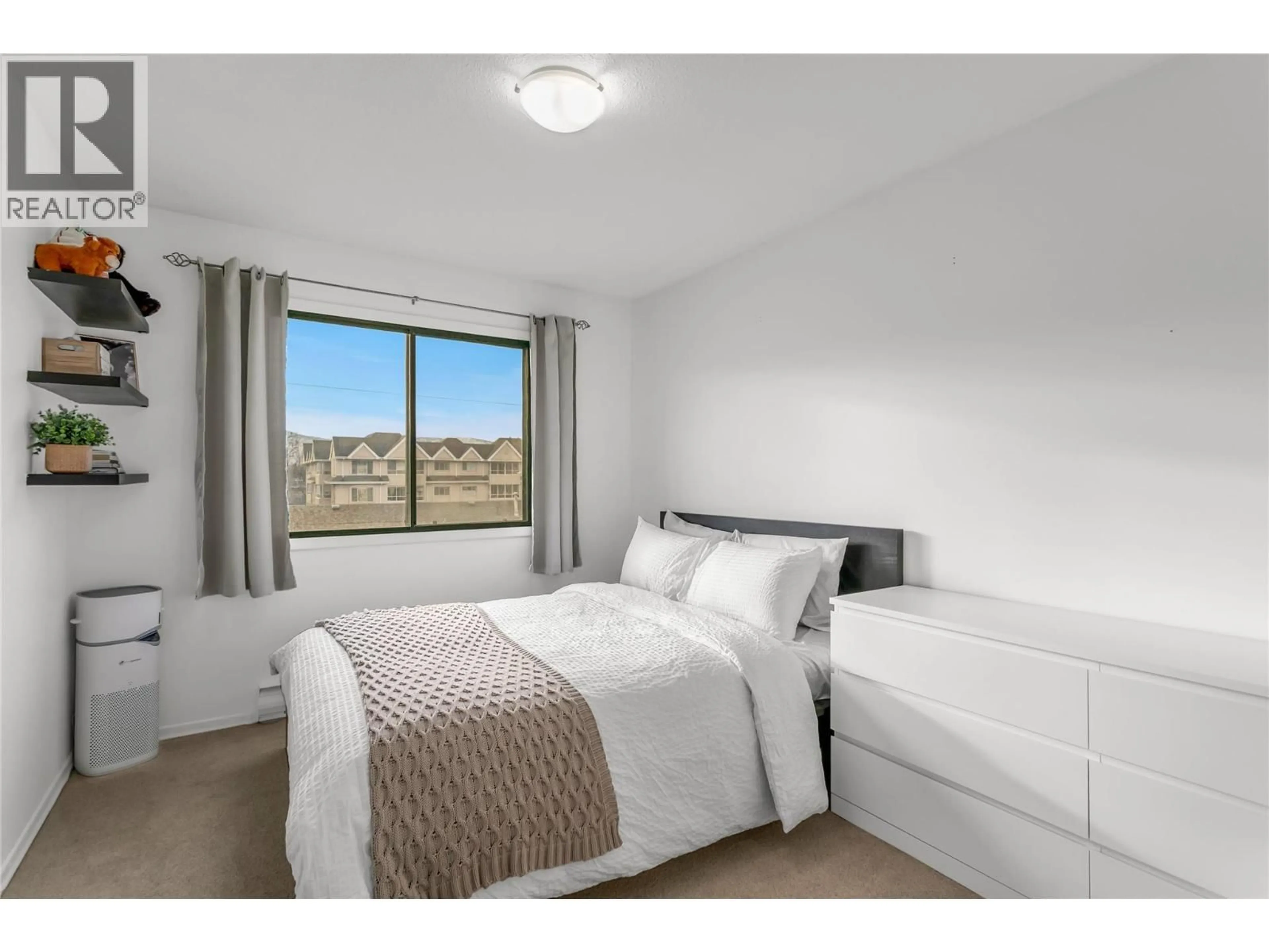 Bedroom with bed, unknown for 308 - 1075 BERNARD AVENUE, Kelowna British Columbia V1Y6P7