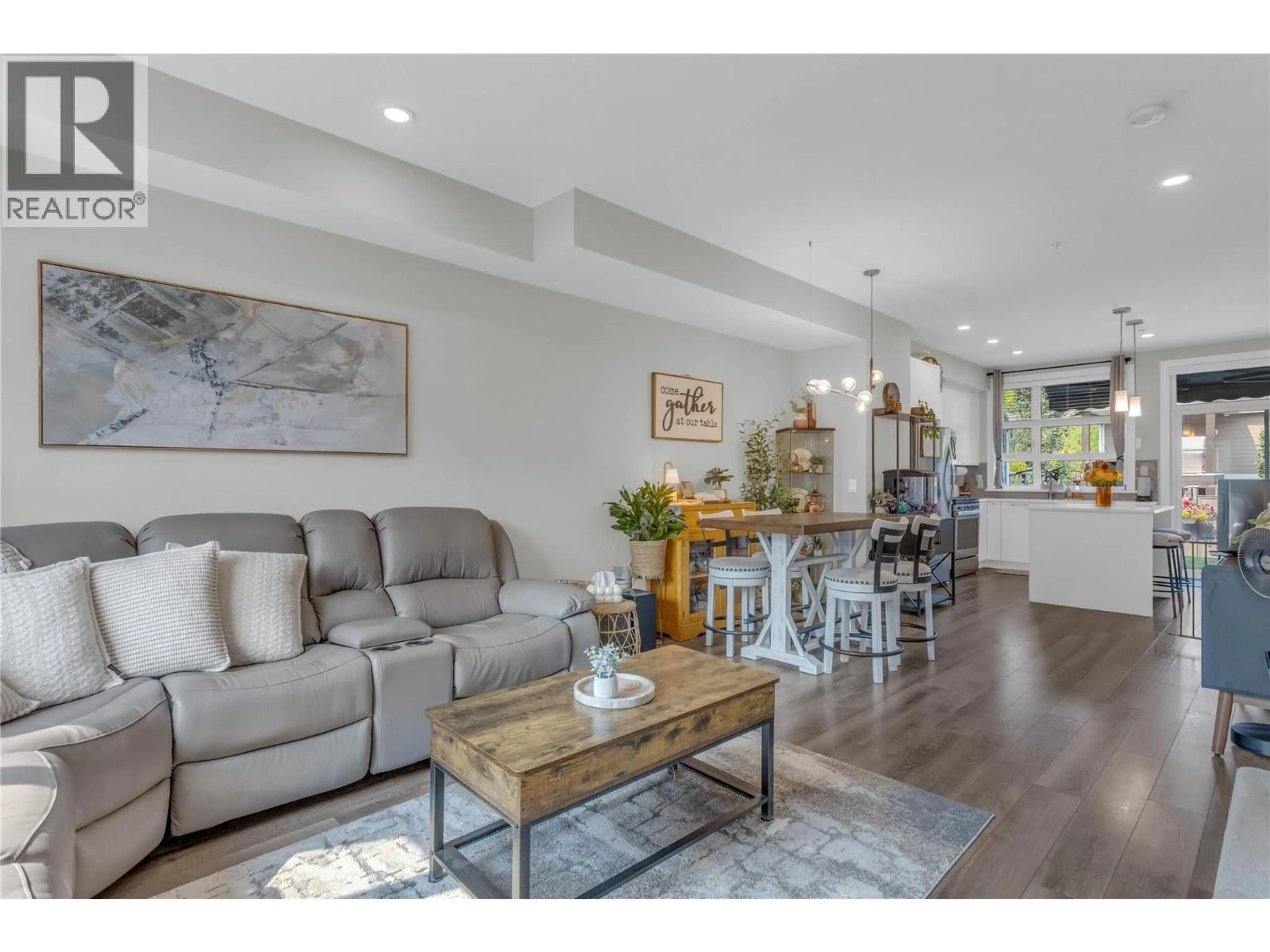 Living room with furniture, wood/laminate floor for 50 - 13098 SHORELINE WAY, Lake Country British Columbia V4V0A8