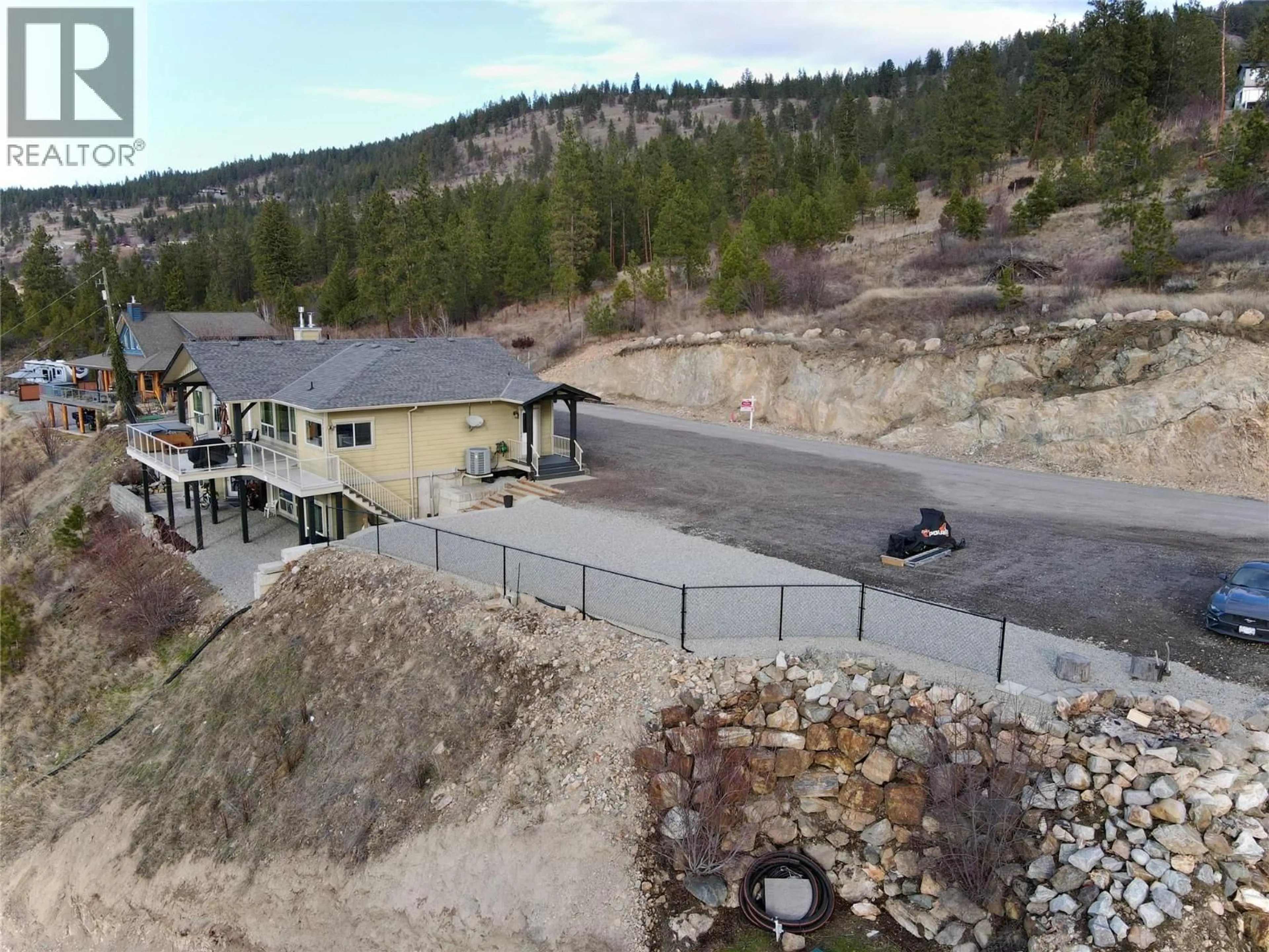 A pic from outside/outdoor area/front of a property/back of a property/a pic from drone, mountain view for 13938 MOBERLY ROAD, Lake Country British Columbia V4V1A6