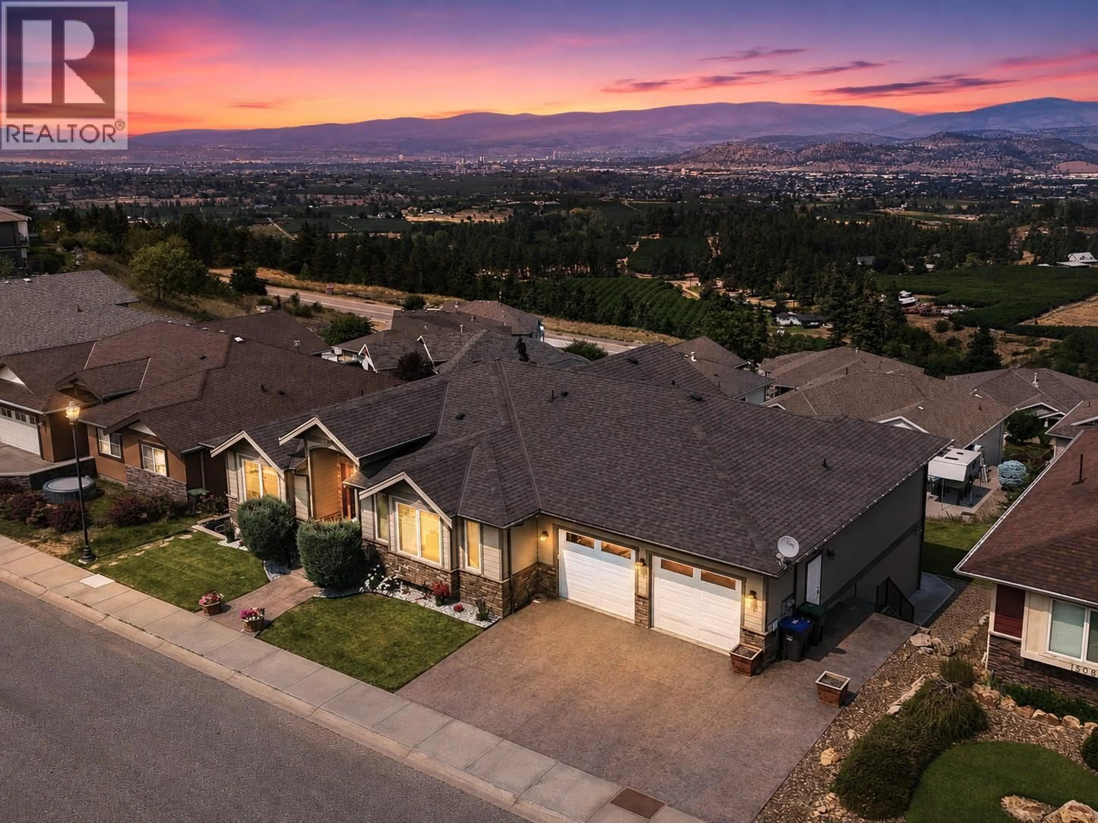 A pic from outside/outdoor area/front of a property/back of a property/a pic from drone, mountain view for 1494 MONTENEGRO DRIVE, Kelowna British Columbia V1P1R3