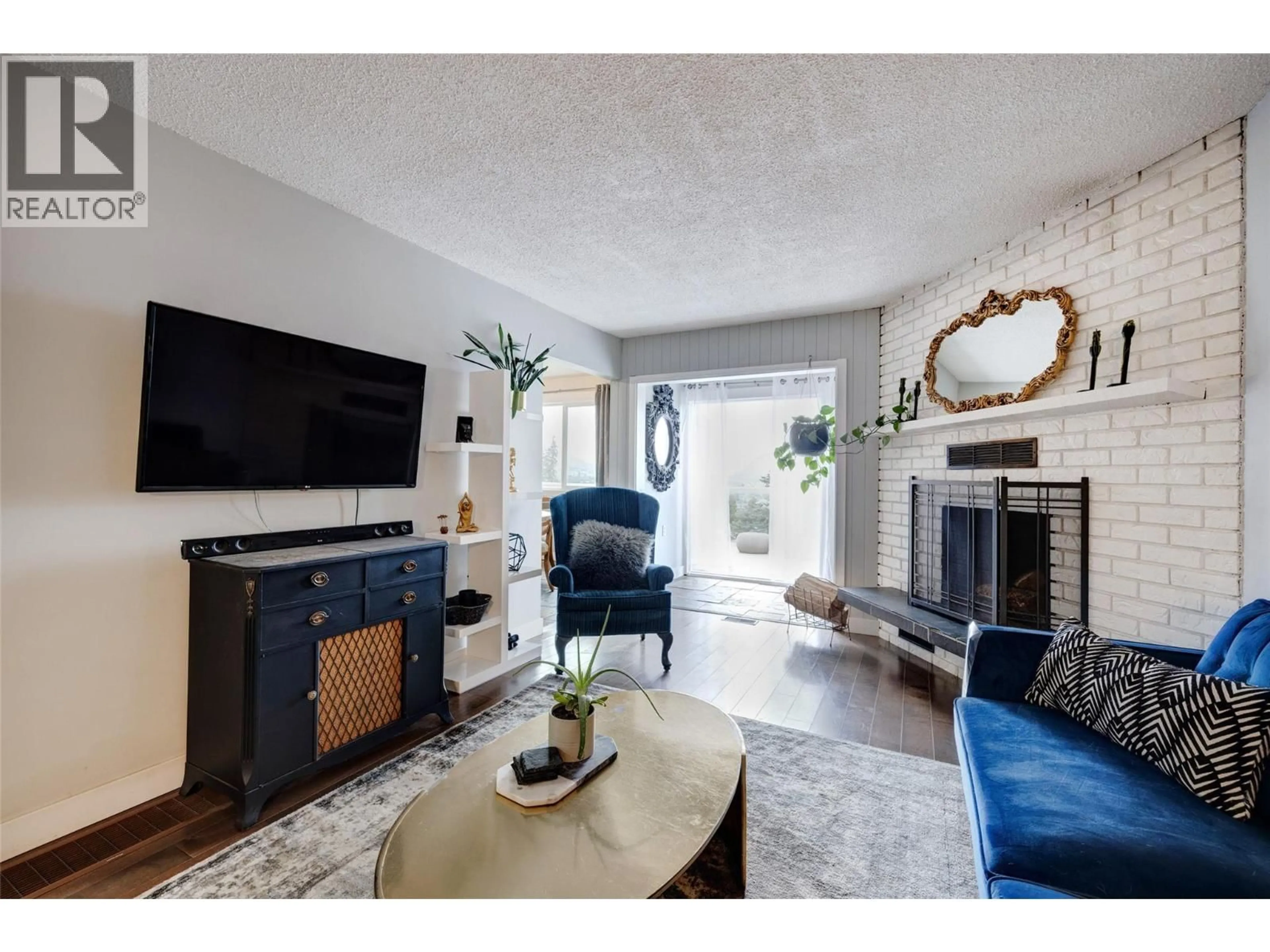 Living room with furniture, unknown for 3874-3876 GLENWAY ROAD, West Kelowna British Columbia V4T1C9