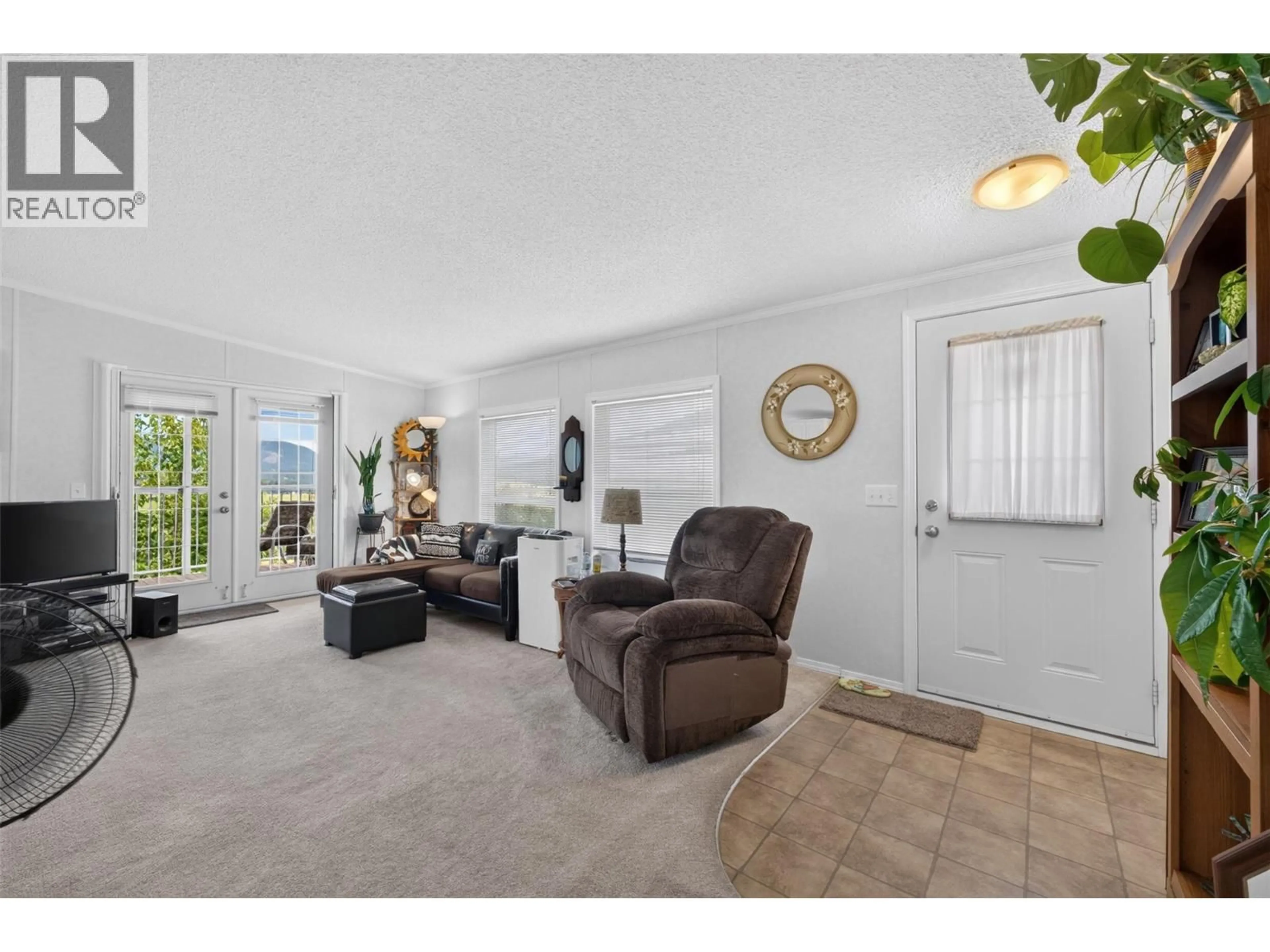 Living room with furniture, unknown for 32 - 1885 TAPPEN NOTCH HILL ROAD, Tappen British Columbia V0E2X3
