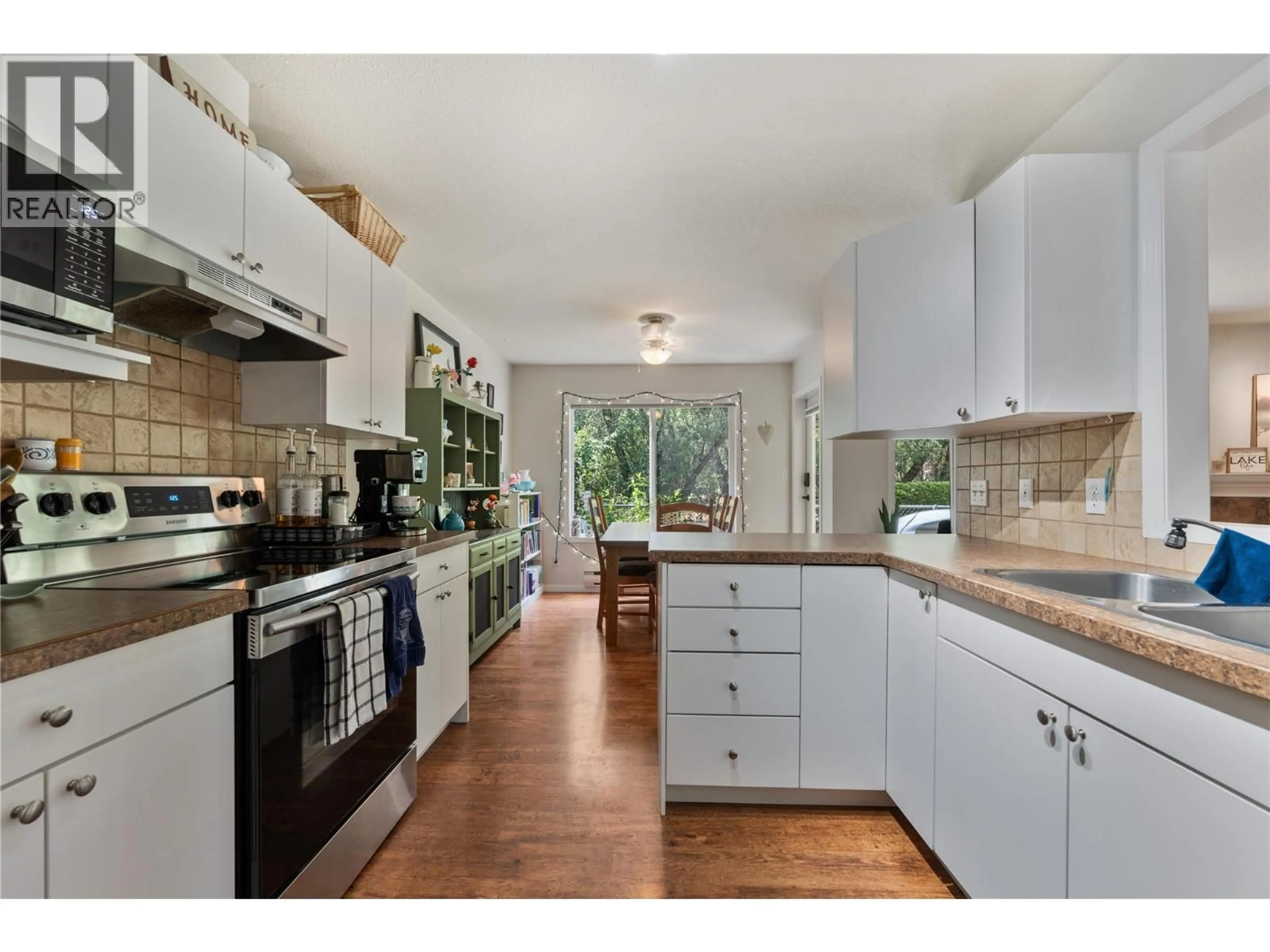 Open concept kitchen, ceramic/tile floor for 8 - 602 BROWNE ROAD, Vernon British Columbia V1T7M1