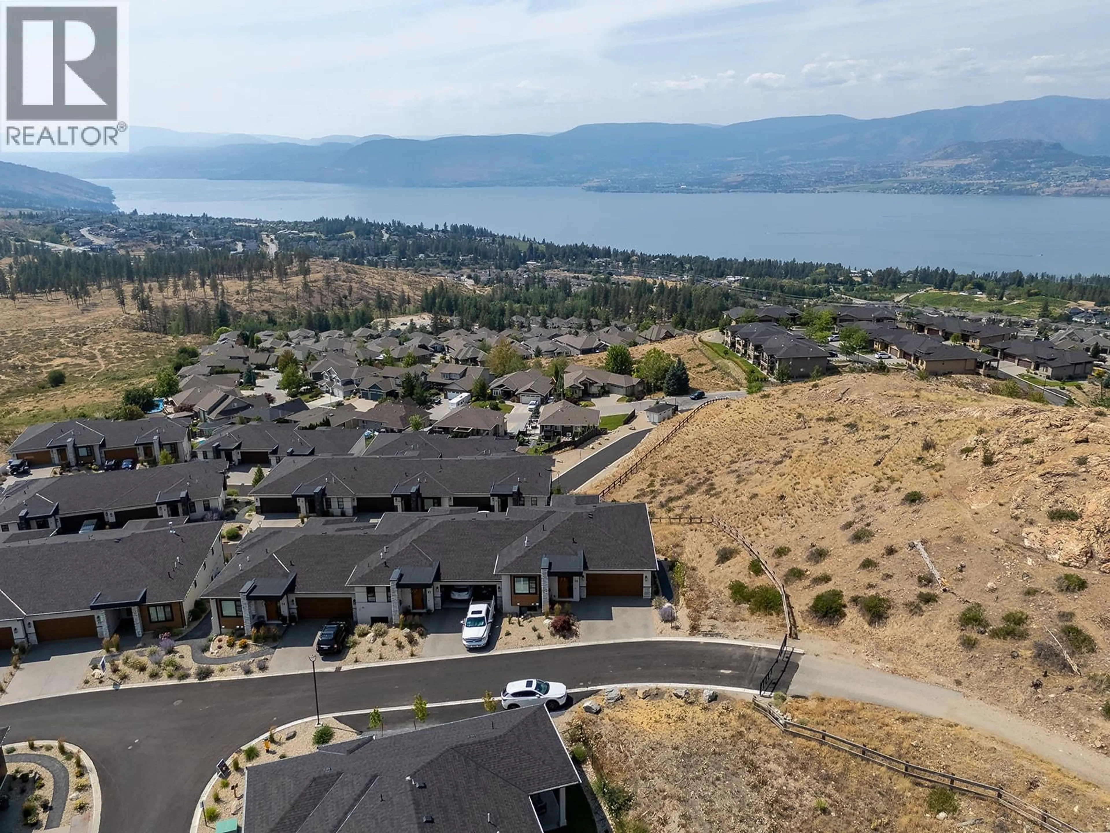 A pic from outside/outdoor area/front of a property/back of a property/a pic from drone, water/lake/river/ocean view for 16 - 796 KUIPERS CRESCENT, Kelowna British Columbia V1W0C2