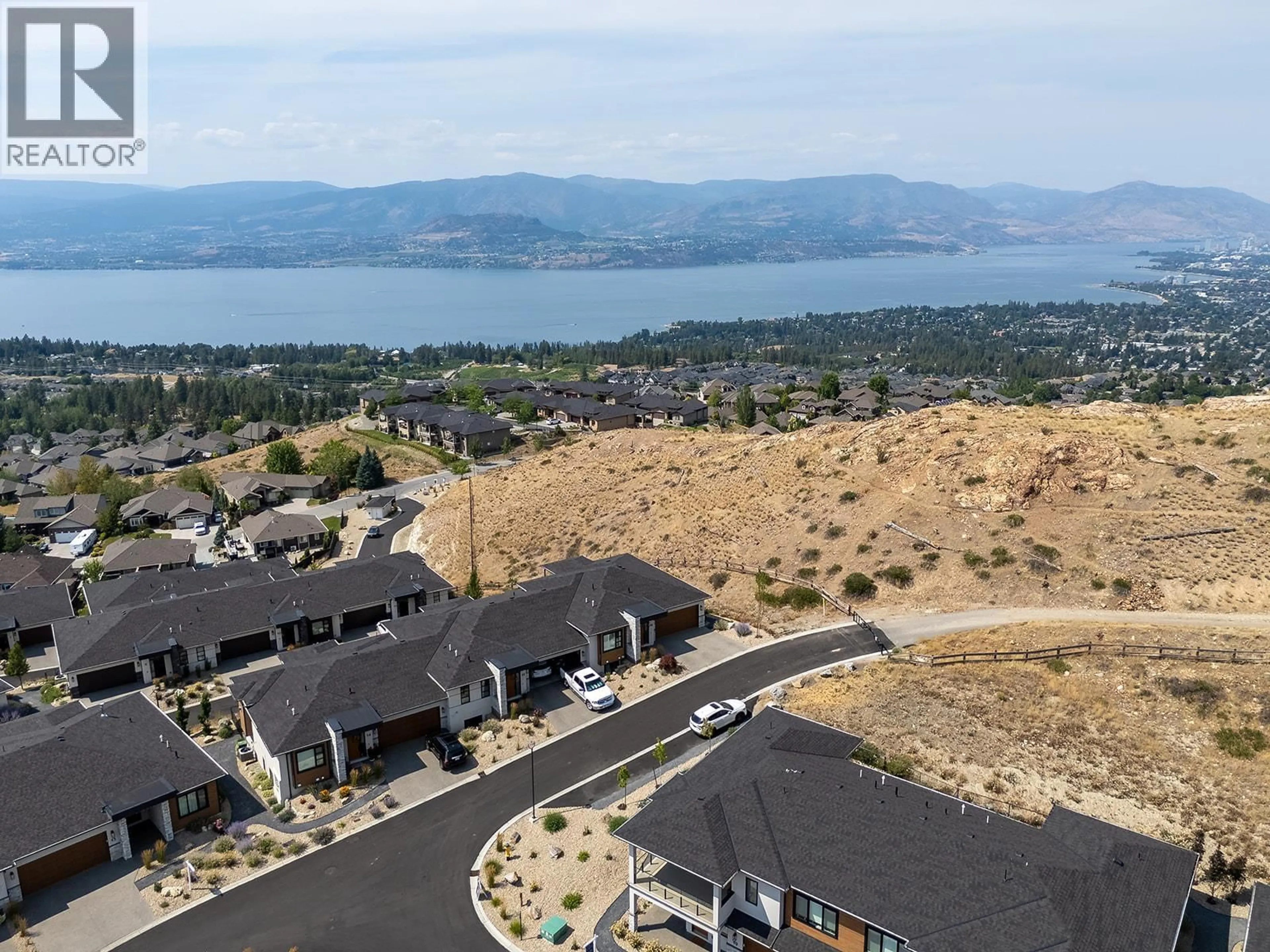 A pic from outside/outdoor area/front of a property/back of a property/a pic from drone, mountain view for 16 - 796 KUIPERS CRESCENT, Kelowna British Columbia V1W0C2