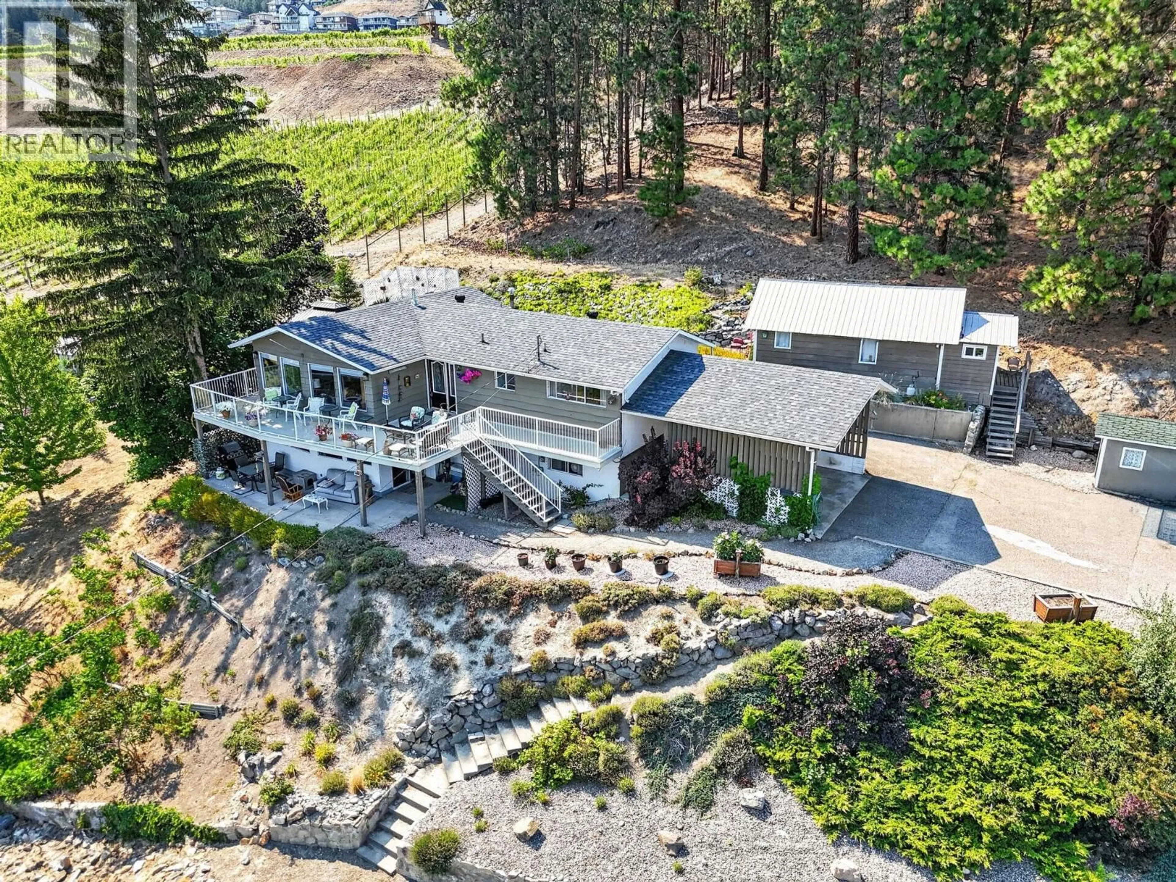A pic from outside/outdoor area/front of a property/back of a property/a pic from drone, unknown for 5868 MACGREGOR ROAD, Peachland British Columbia V0H1X4