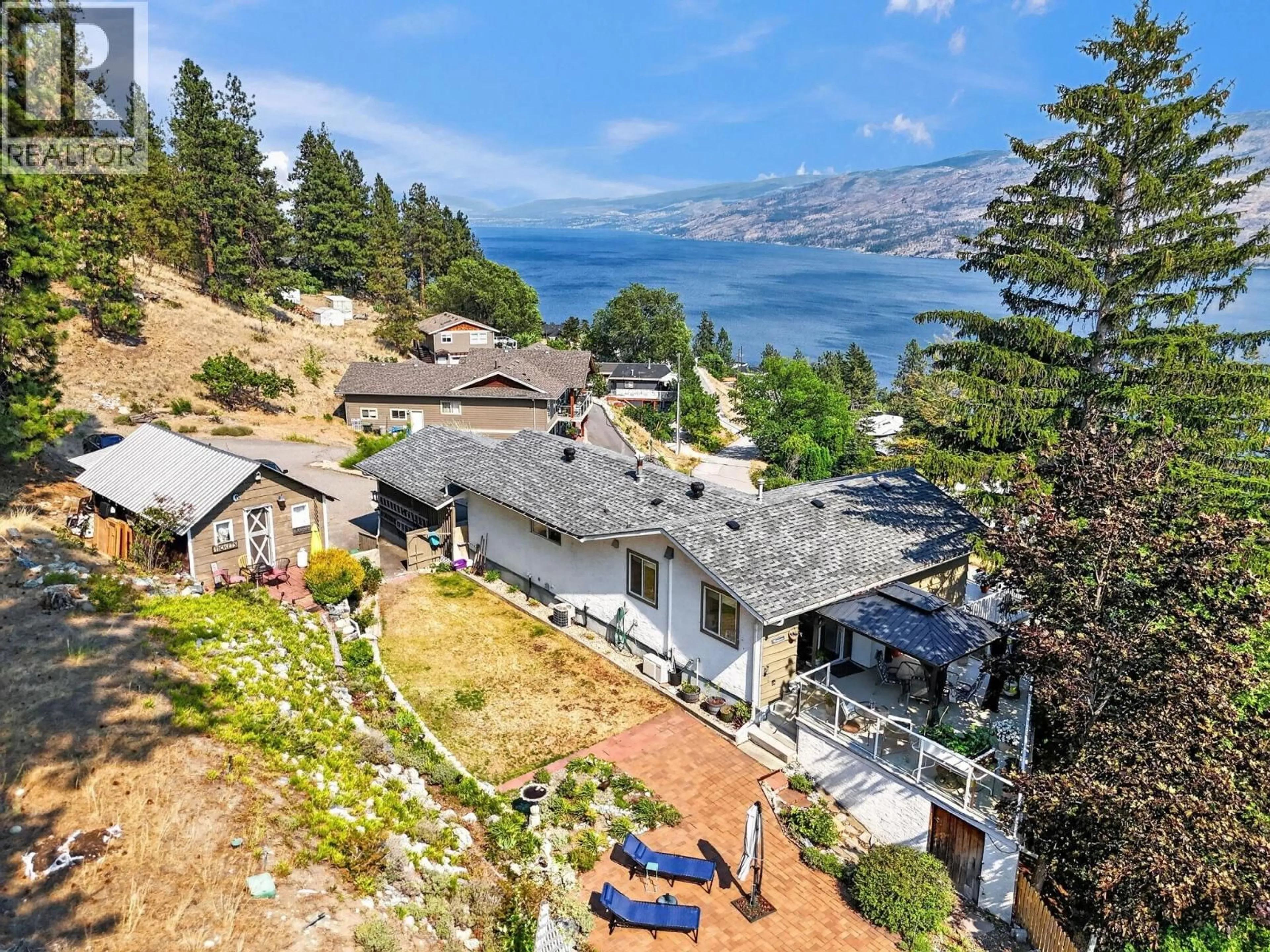 A pic from outside/outdoor area/front of a property/back of a property/a pic from drone, water/lake/river/ocean view for 5868 MACGREGOR ROAD, Peachland British Columbia V0H1X4