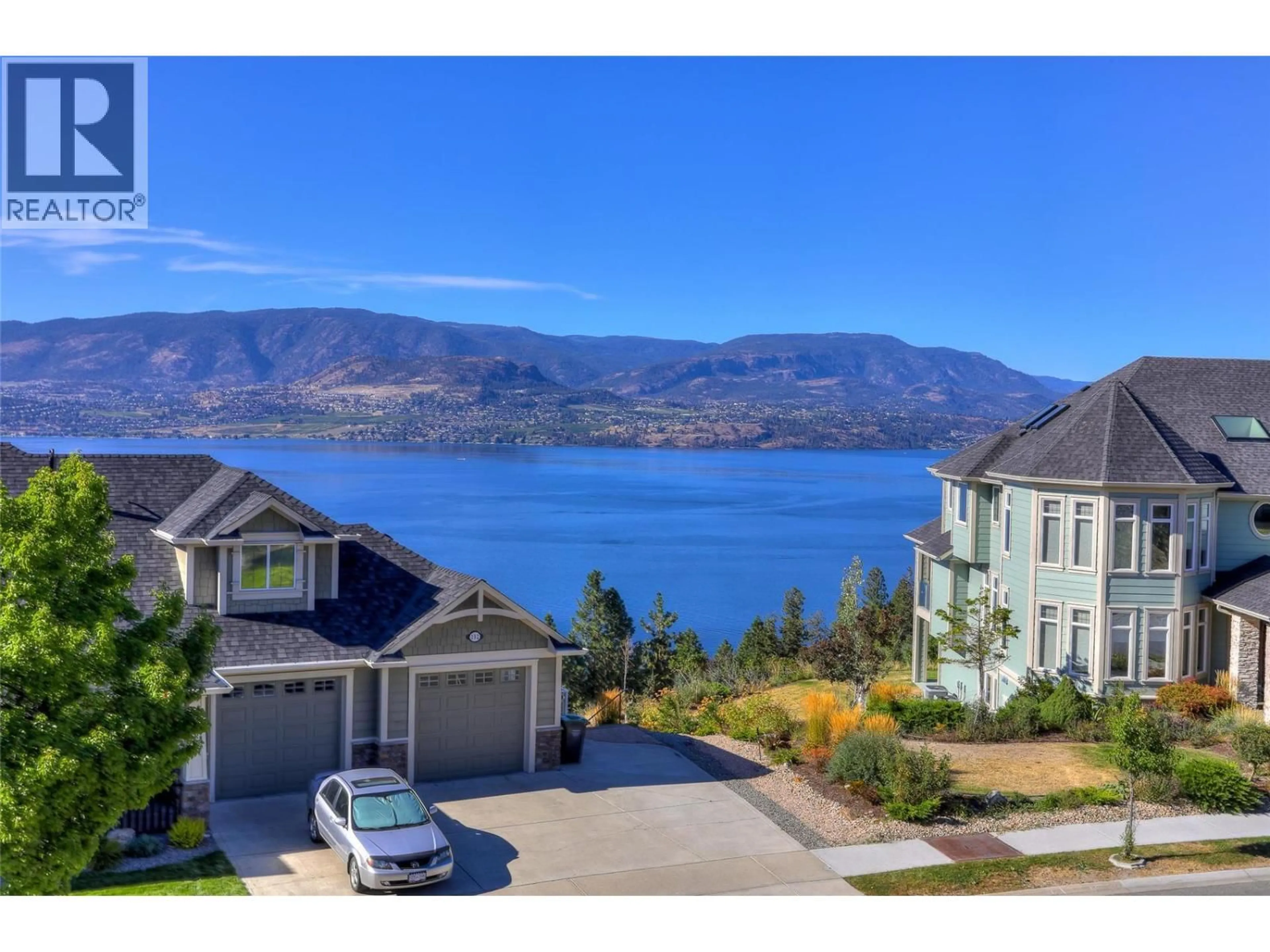 A pic from outside/outdoor area/front of a property/back of a property/a pic from drone, water/lake/river/ocean view for 390 QUILCHENA DRIVE, Kelowna British Columbia V1W4W4