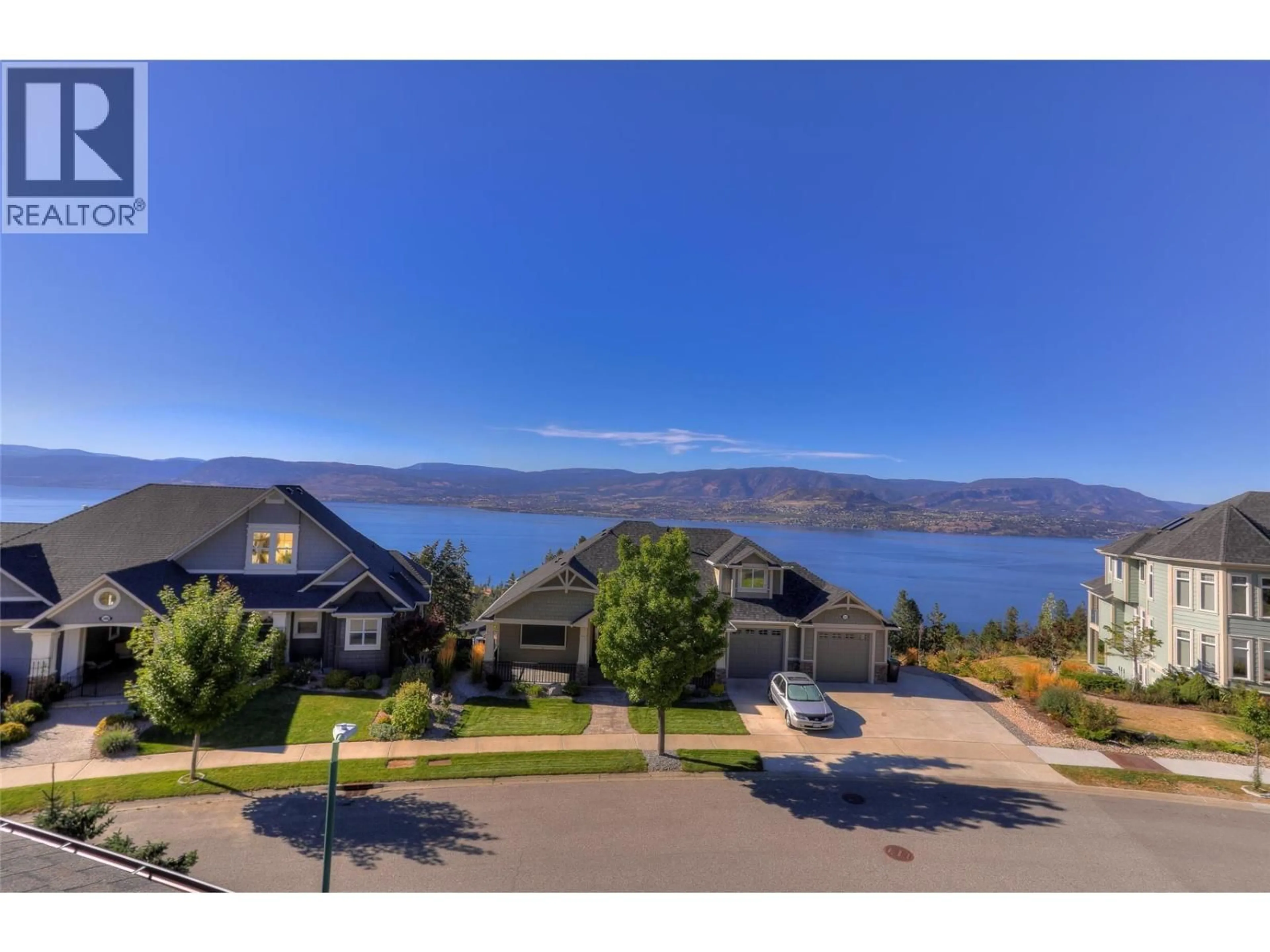 A pic from outside/outdoor area/front of a property/back of a property/a pic from drone, water/lake/river/ocean view for 390 QUILCHENA DRIVE, Kelowna British Columbia V1W4W4