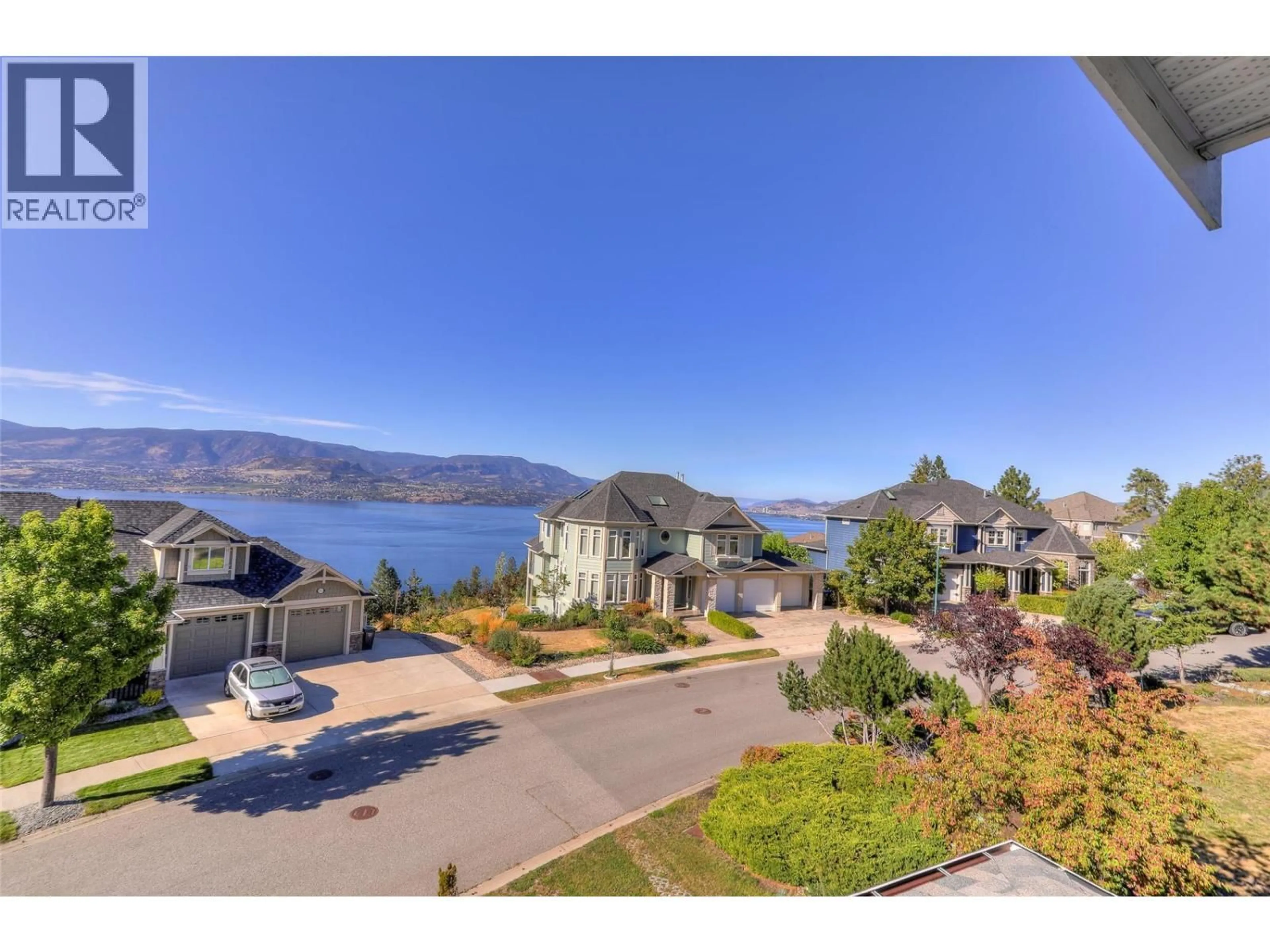 A pic from outside/outdoor area/front of a property/back of a property/a pic from drone, water/lake/river/ocean view for 390 QUILCHENA DRIVE, Kelowna British Columbia V1W4W4