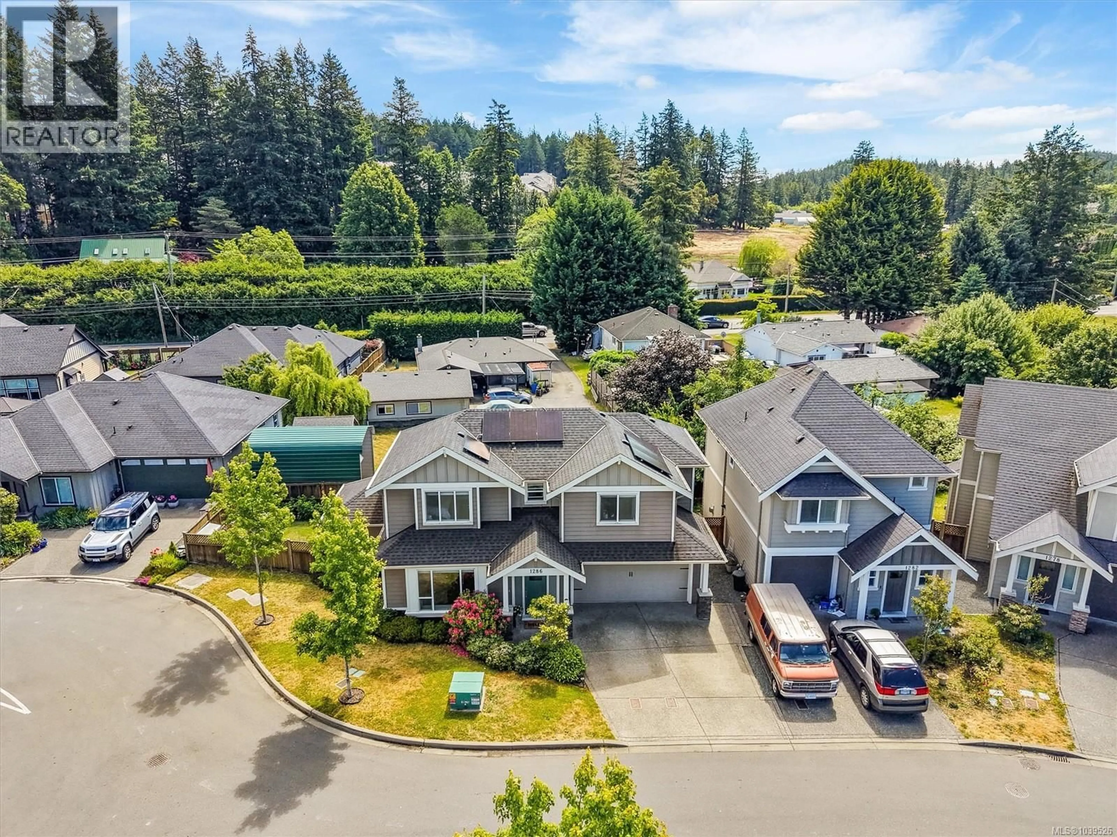 A pic from outside/outdoor area/front of a property/back of a property/a pic from drone, street for 1286 MCLEOD PLACE, Langford British Columbia V9C0K6