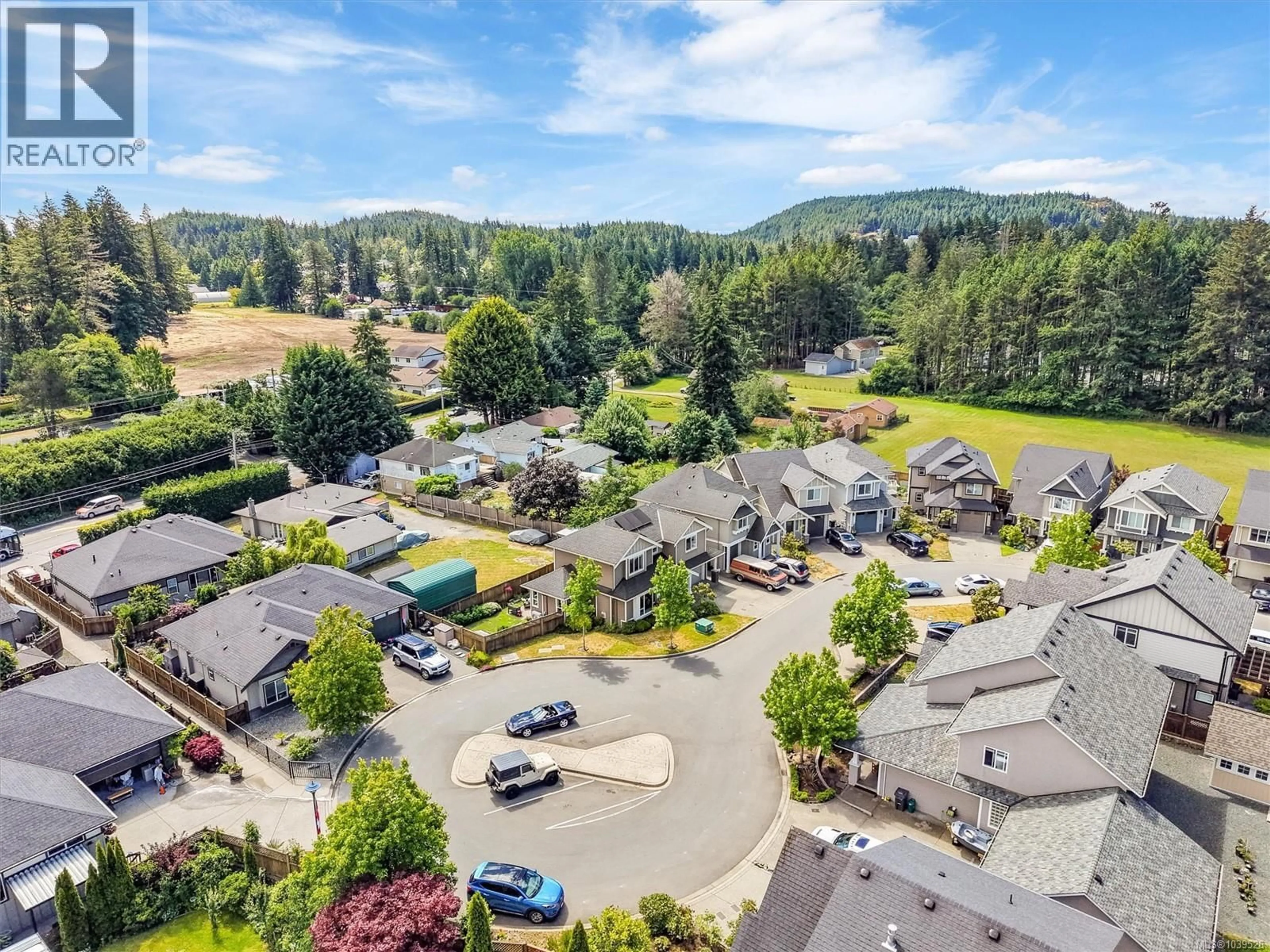 A pic from outside/outdoor area/front of a property/back of a property/a pic from drone, mountain view for 1286 MCLEOD PLACE, Langford British Columbia V9C0K6