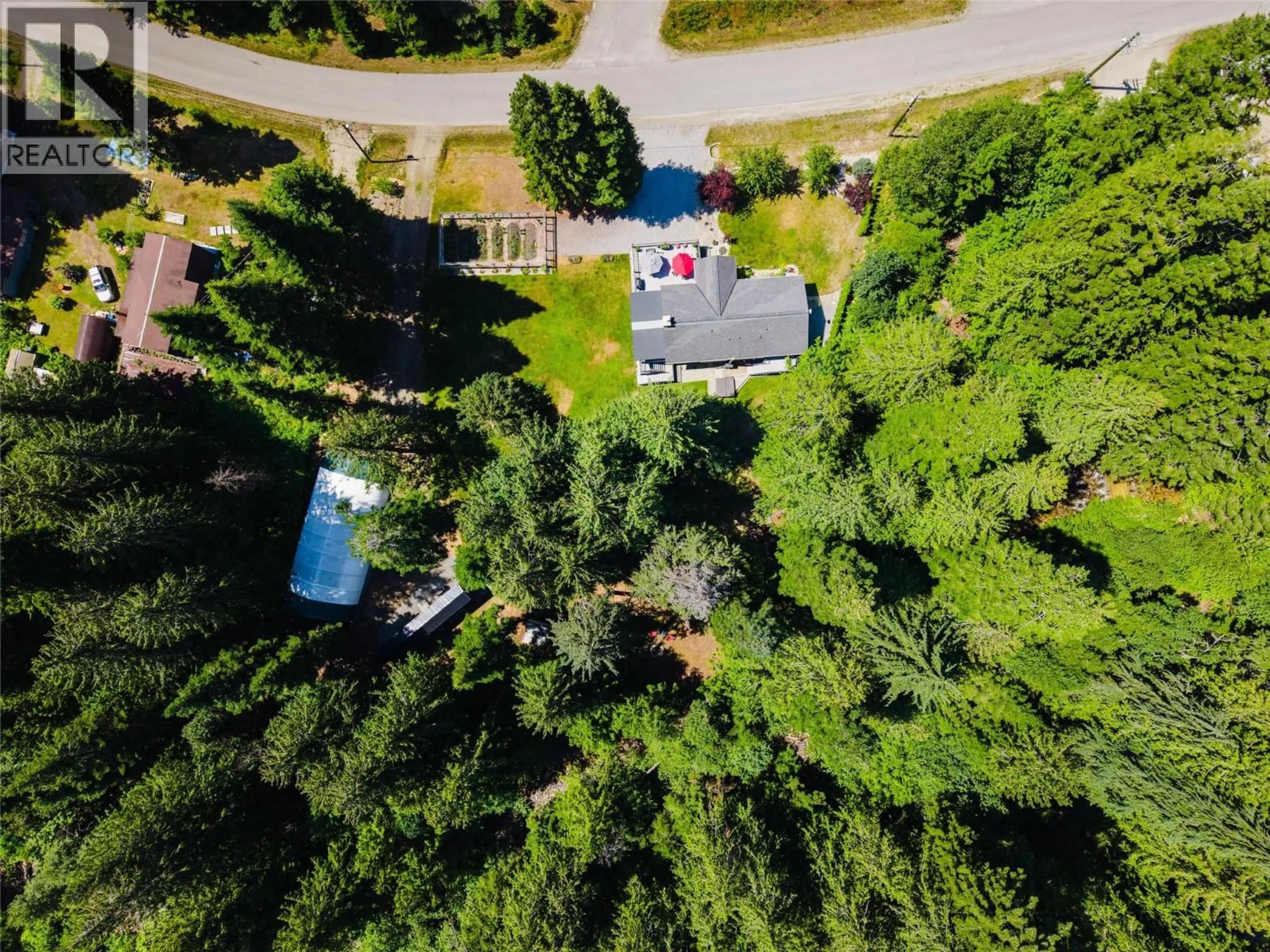 A pic from outside/outdoor area/front of a property/back of a property/a pic from drone, forest/trees view for 262 BRYAN ROAD, Nelson British Columbia V1L6M9