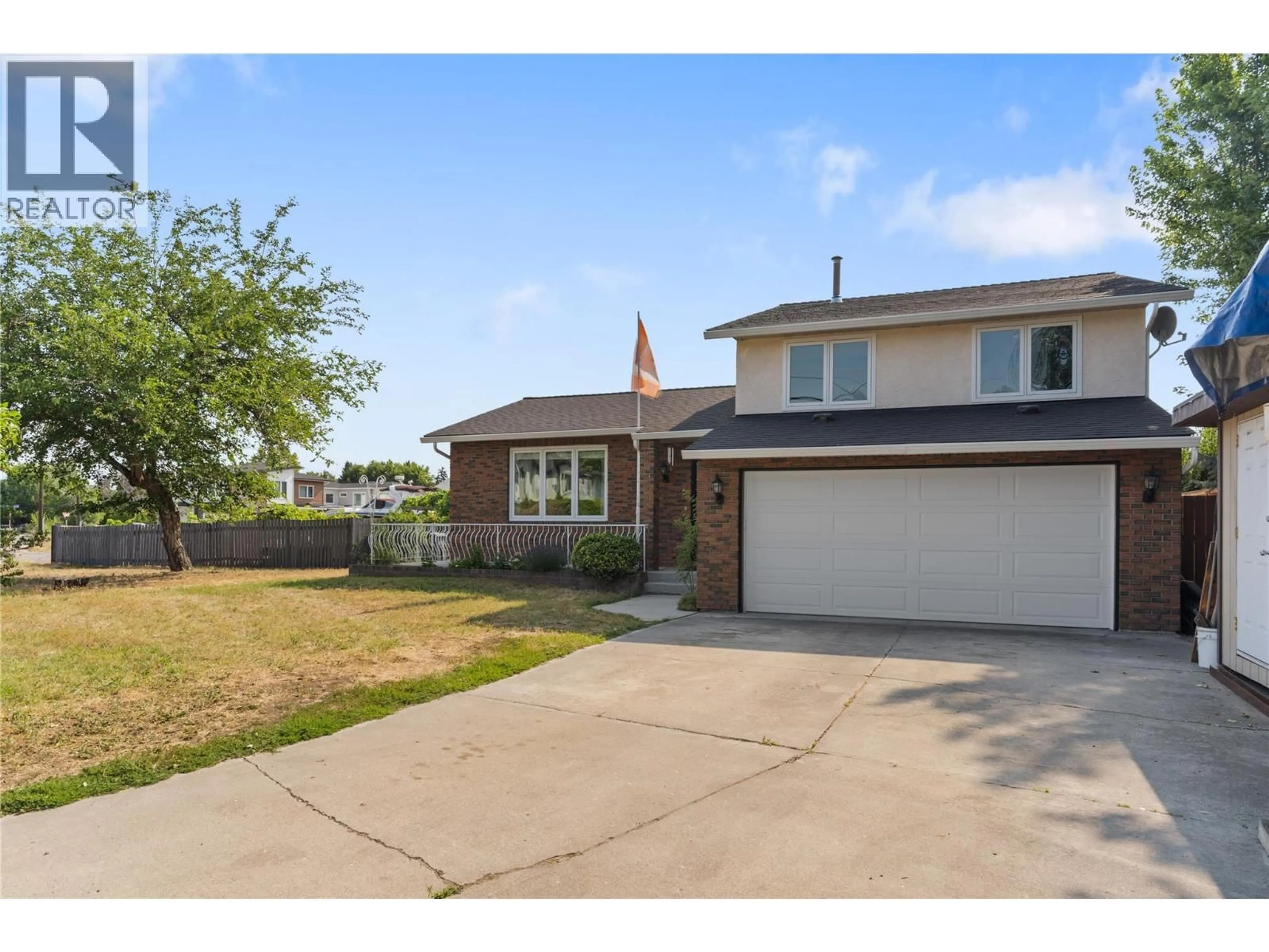 Home with brick exterior material, street for 4201 LAKESHORE ROAD, Kelowna British Columbia V1W4H7