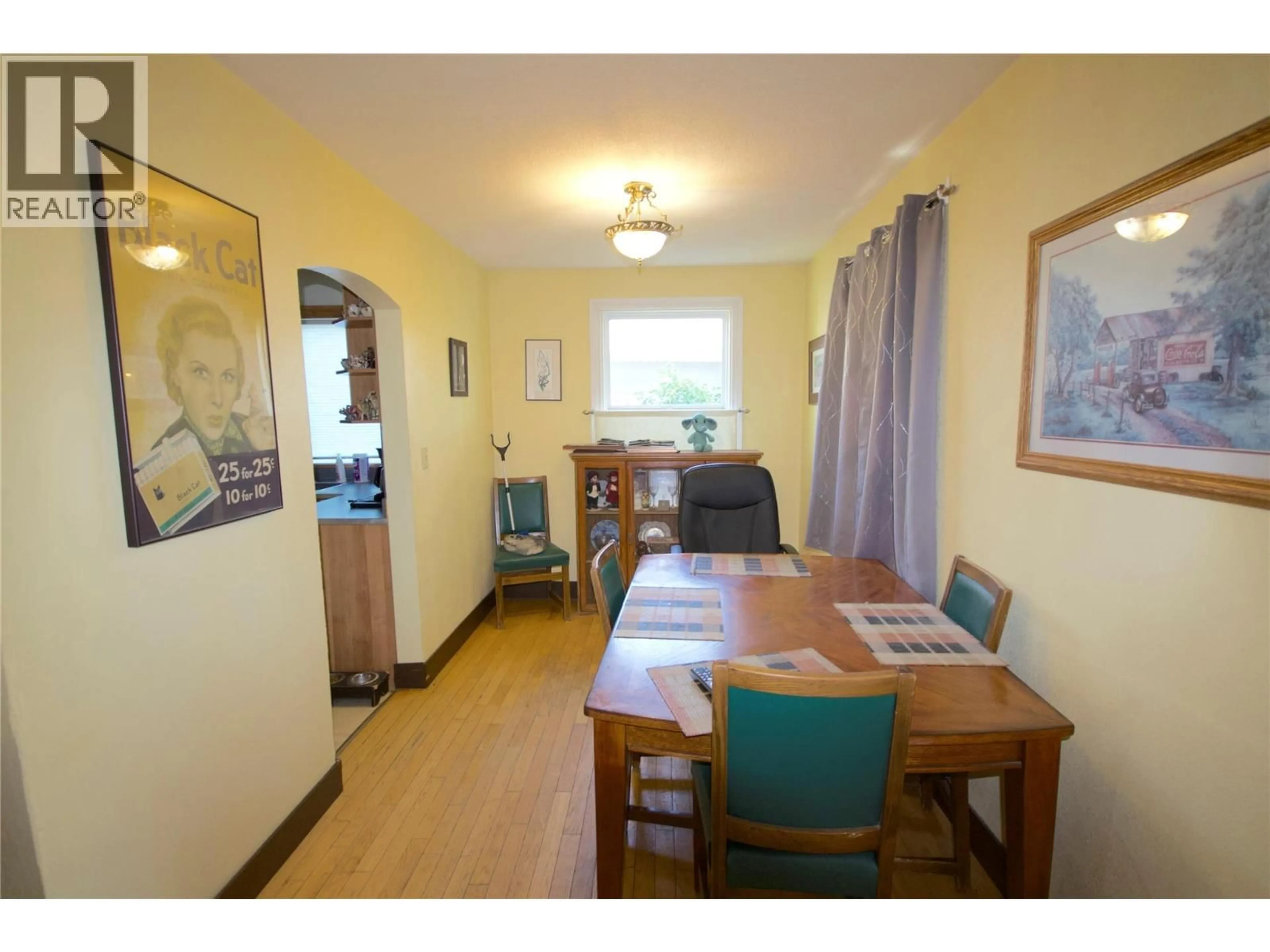 Dining room, wood/laminate floor for 904 107 AVENUE, Dawson Creek British Columbia V1G2R4