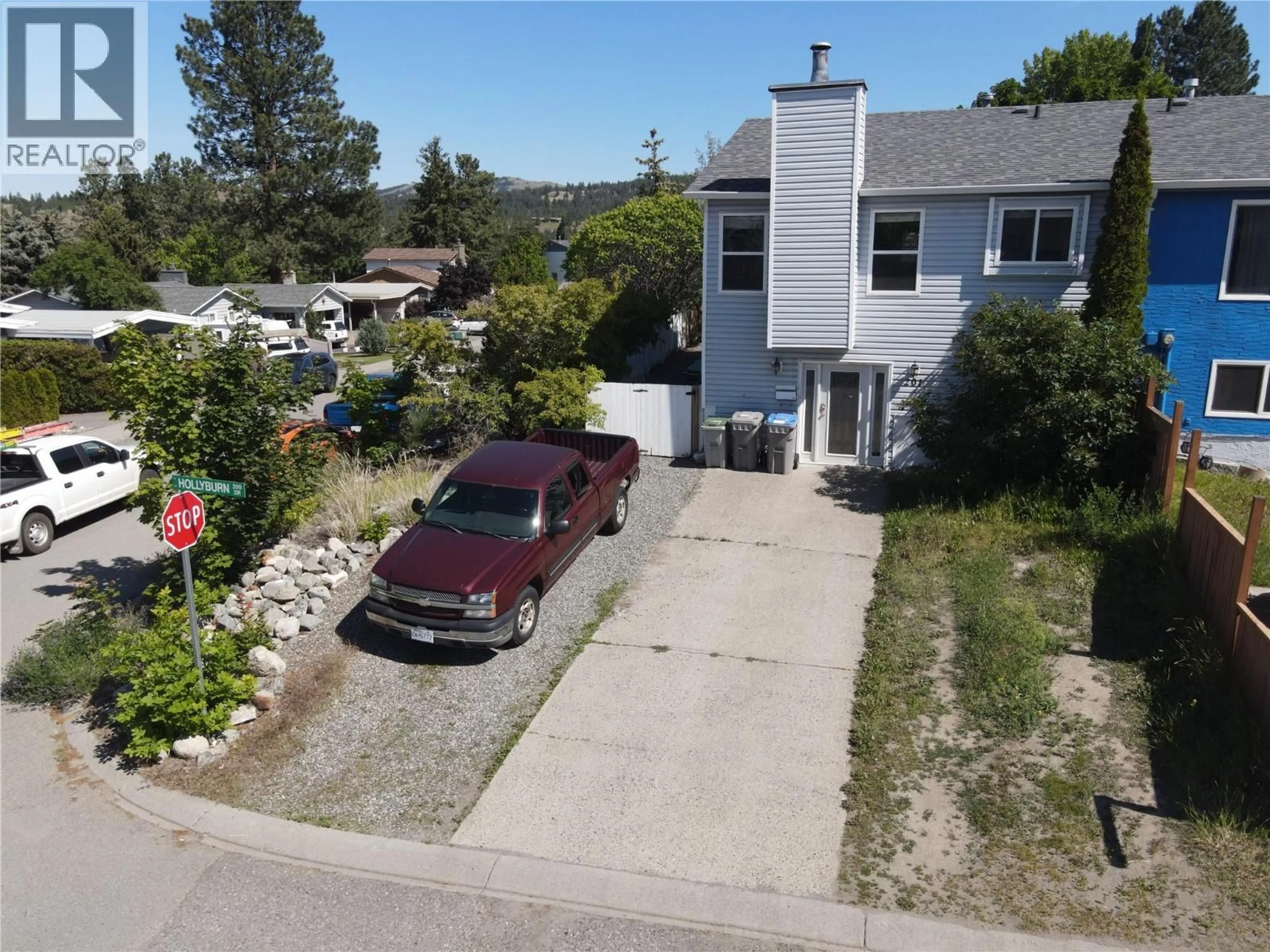 A pic from outside/outdoor area/front of a property/back of a property/a pic from drone, street for 201 HOLLYBURN DRIVE, Kamloops British Columbia V2E1Y9