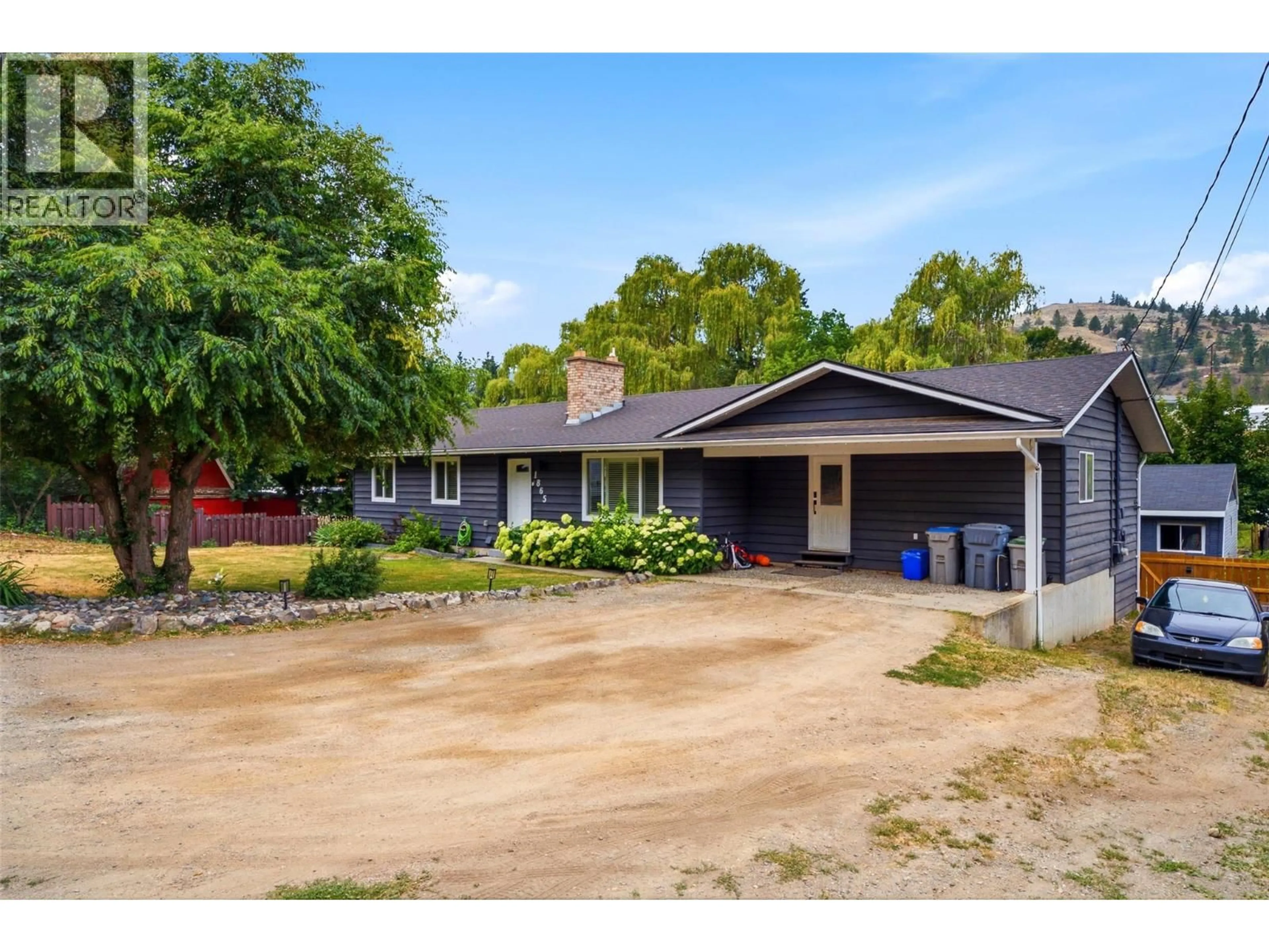 A pic from outside/outdoor area/front of a property/back of a property/a pic from drone, street for 1865 SHUMWAY ROAD, Kamloops British Columbia V2C6T7