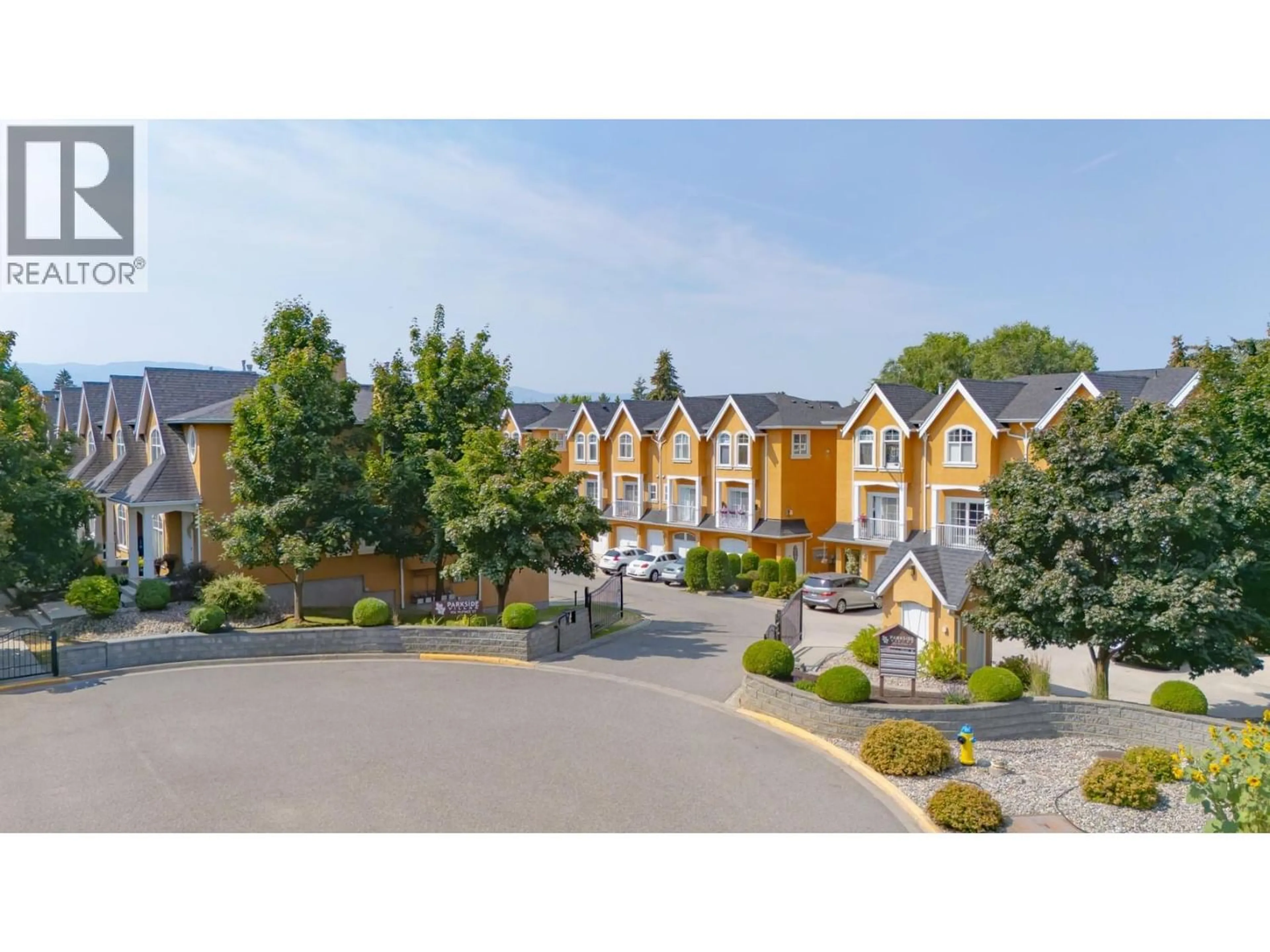 A pic from outside/outdoor area/front of a property/back of a property/a pic from drone, mountain view for 108 - 456 MCPHEE STREET, Kelowna British Columbia V1X8C5