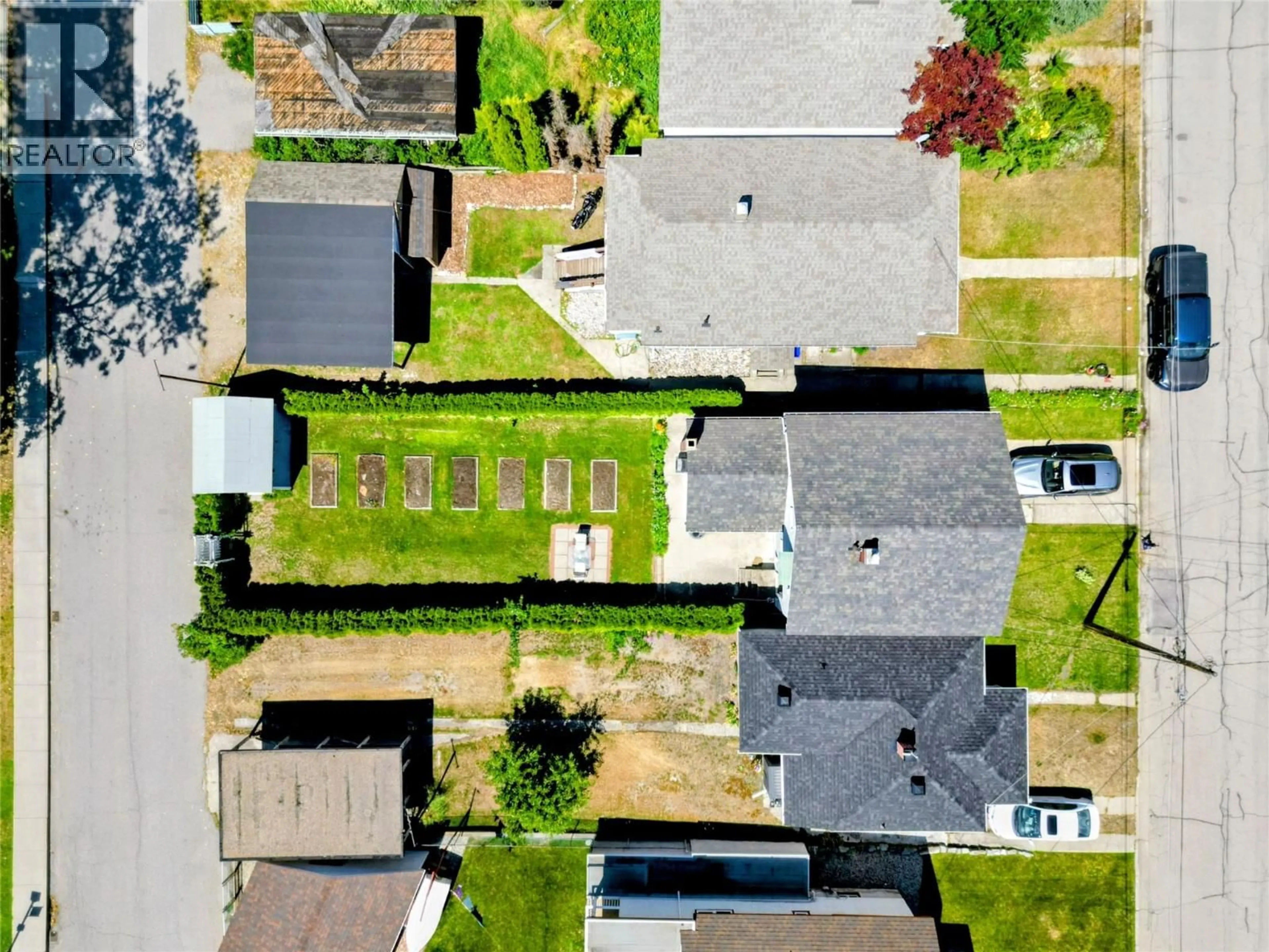 A pic from outside/outdoor area/front of a property/back of a property/a pic from drone, street for 1188 COLUMBIA AVENUE, Trail British Columbia V1R4L2
