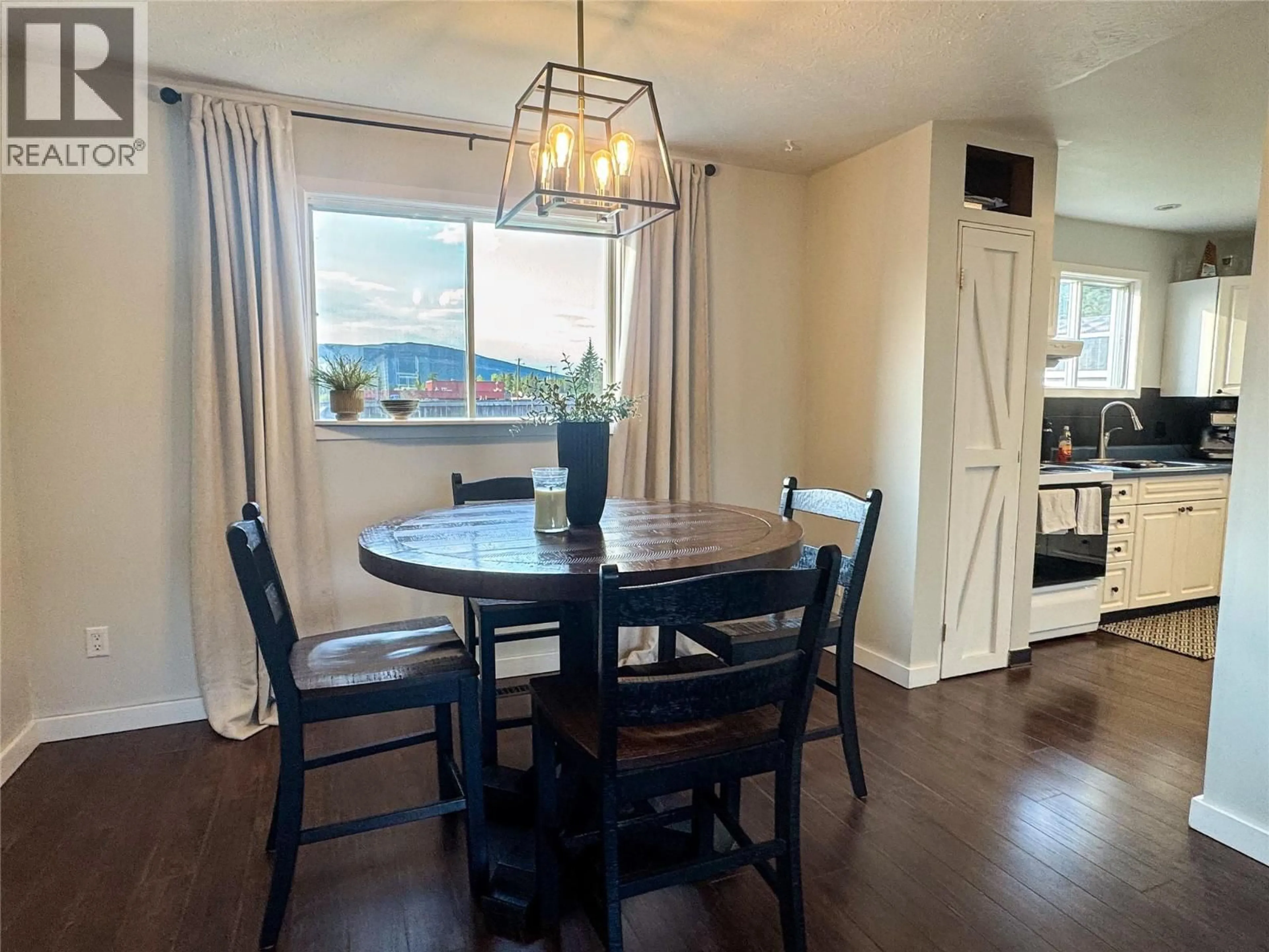 Dining room, wood/laminate floor for 175 VALLEYVIEW CRESCENT, Tumbler Ridge British Columbia V0C2W0