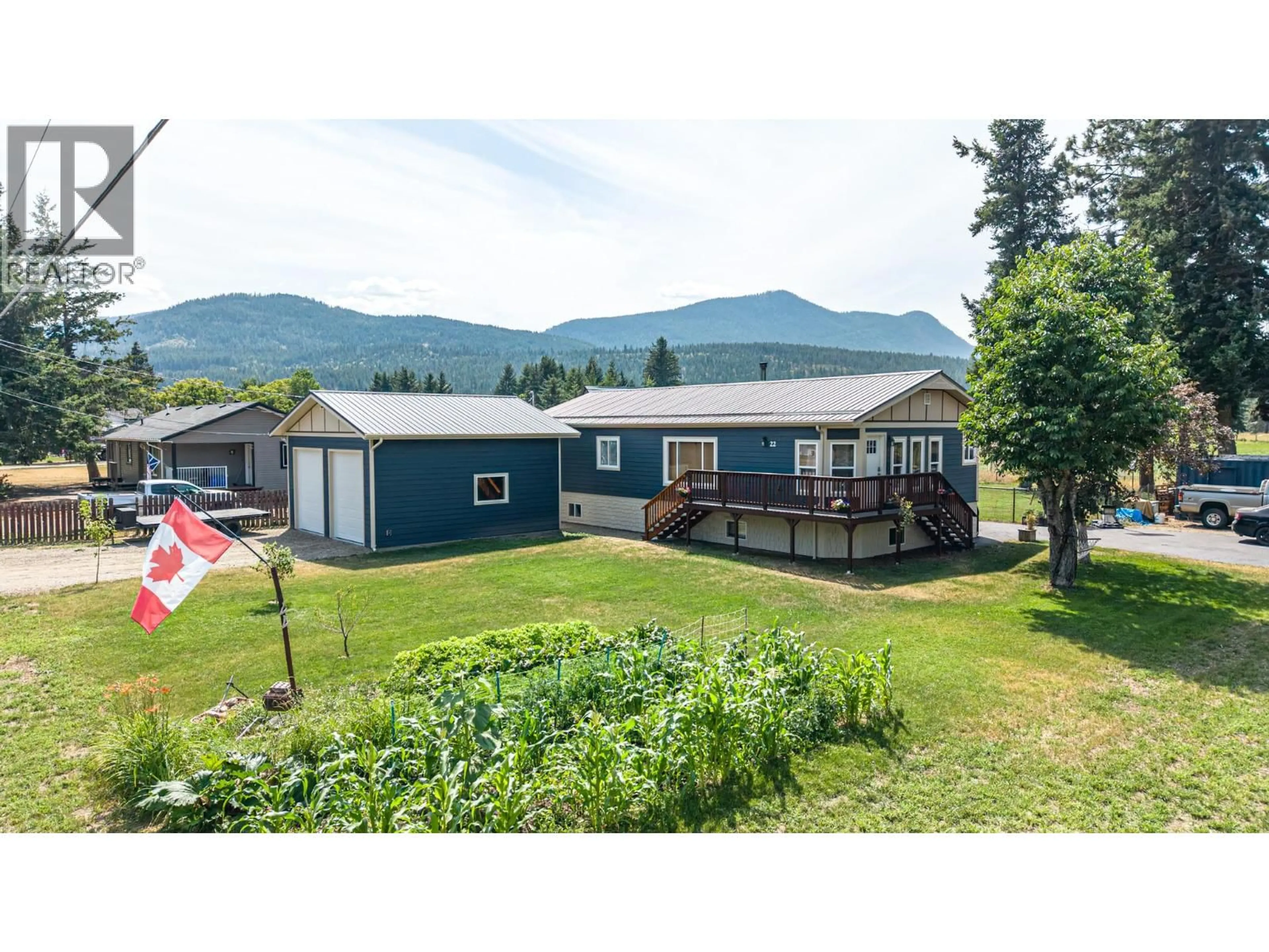 A pic from outside/outdoor area/front of a property/back of a property/a pic from drone, mountain view for 22 PEMBERTON ROAD, Lumby British Columbia V0E2G7