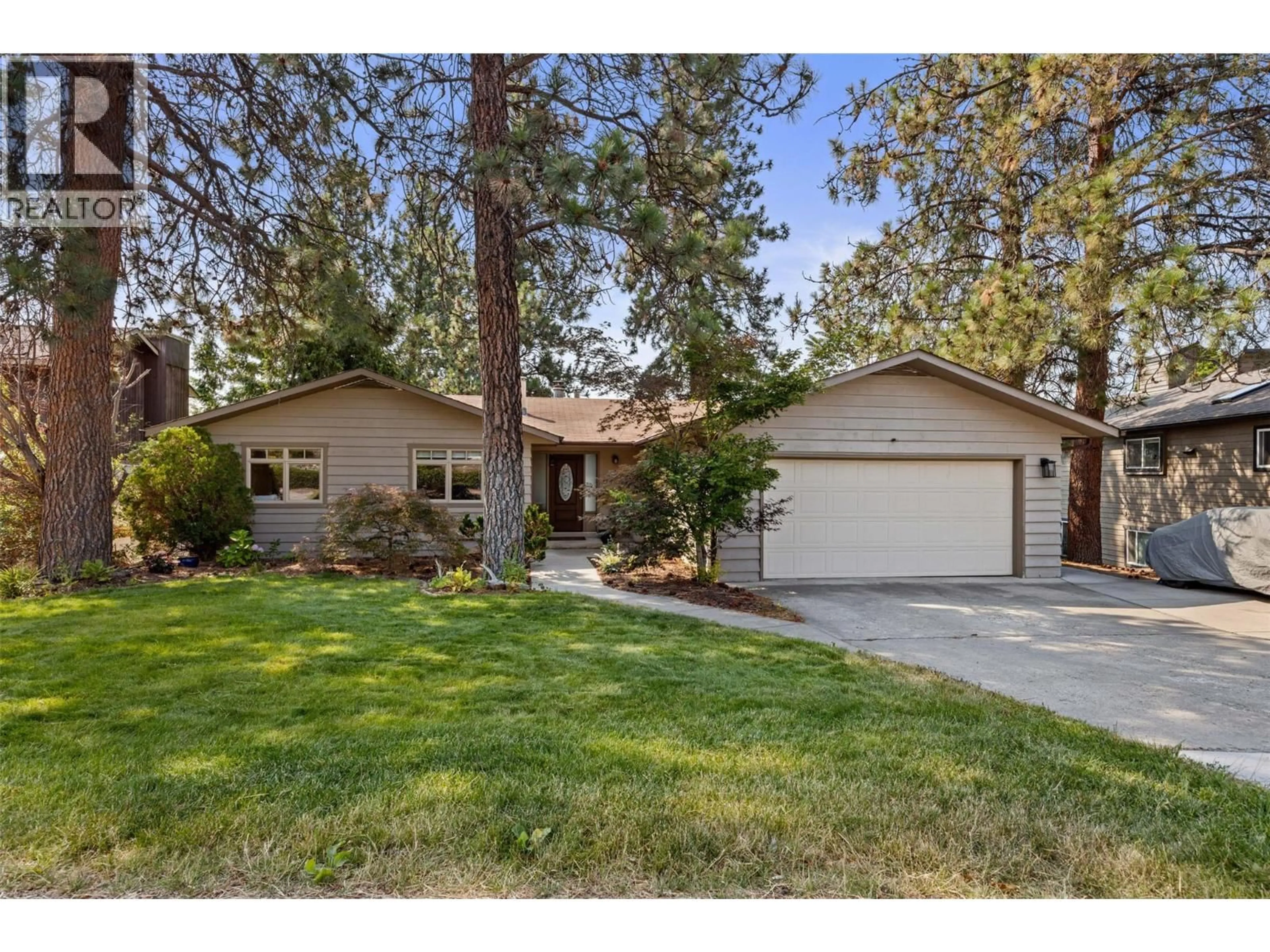 Home with vinyl exterior material, street for 2185 SHANNON WAY, West Kelowna British Columbia V4T1S2