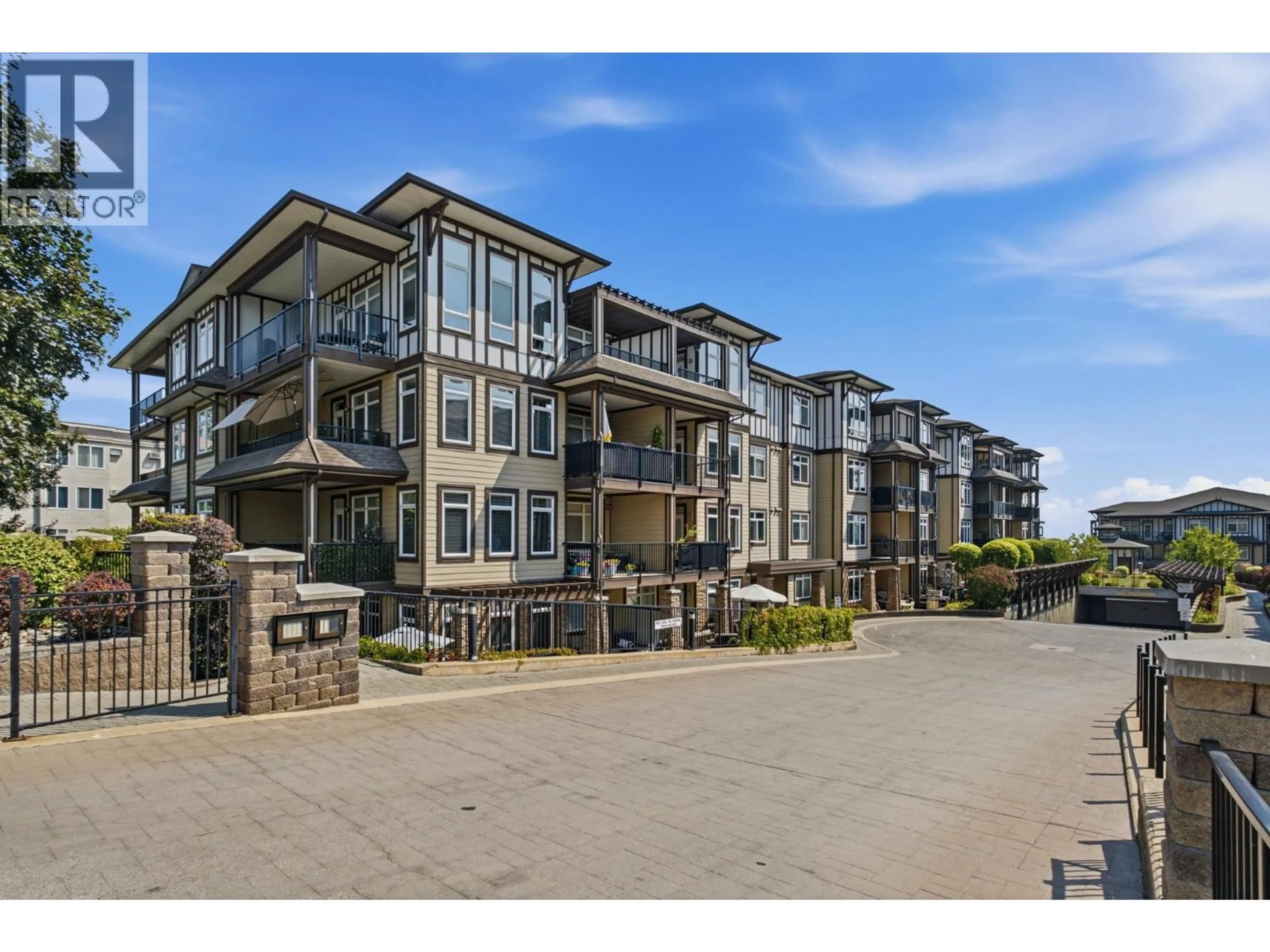 A pic from outside/outdoor area/front of a property/back of a property/a pic from drone, water/lake/river/ocean view for 1402 - 3833 BROWN ROAD, West Kelowna British Columbia V4T2J3
