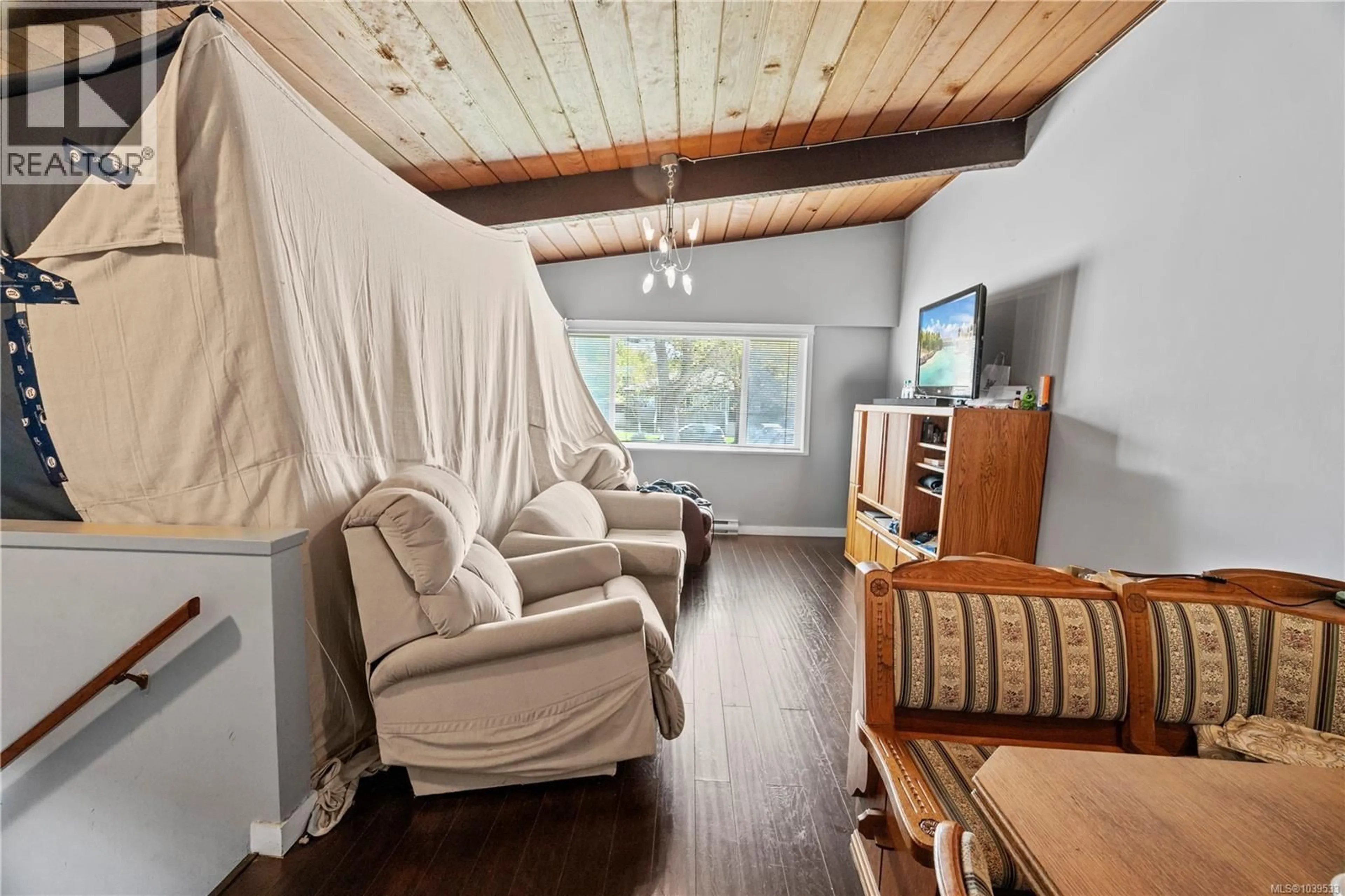 Living room with furniture, wood/laminate floor for 3430 SEATON STREET, Saanich British Columbia V8Z3V9