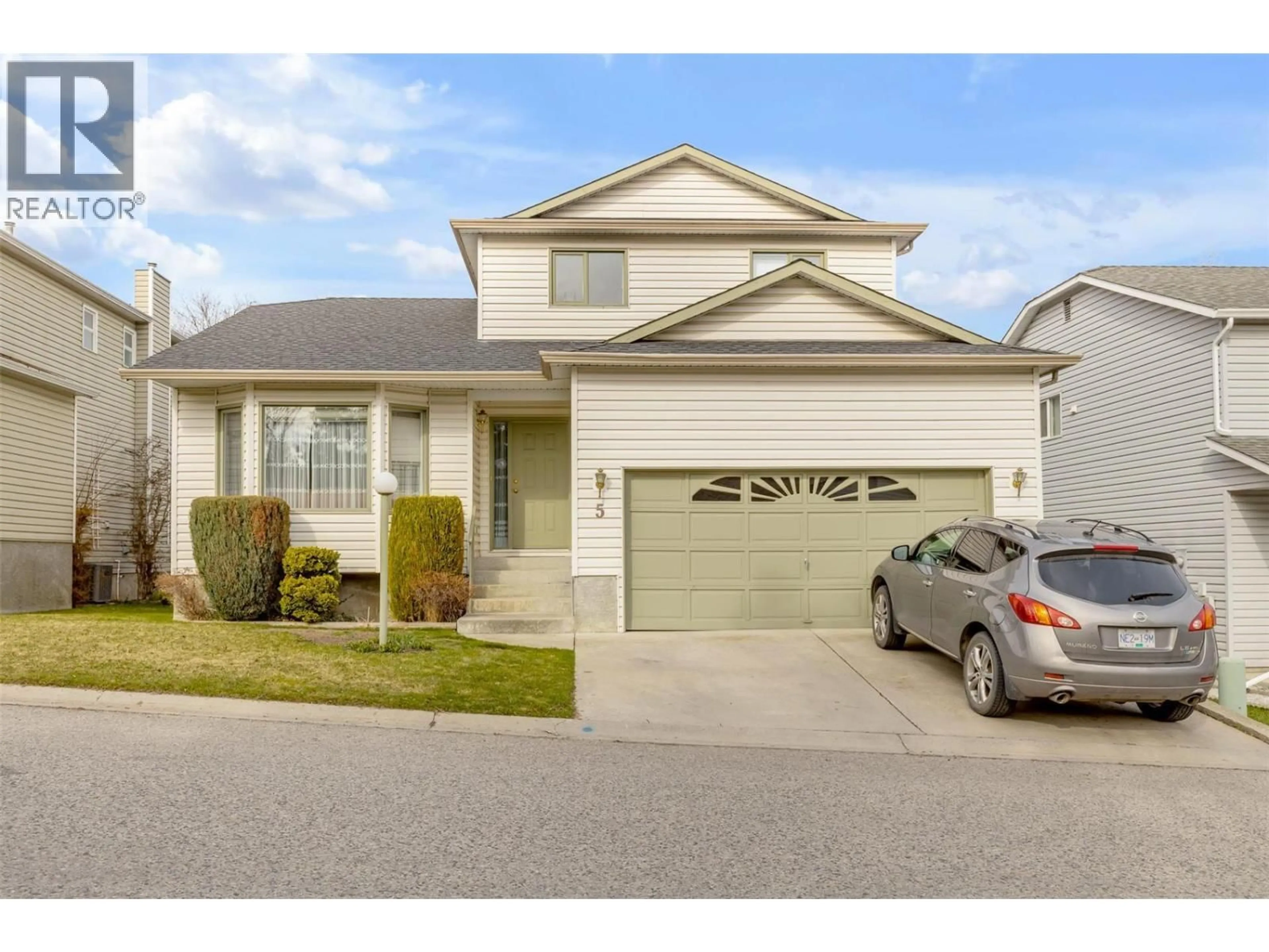 Home with vinyl exterior material, street for 5 - 555 GLENMEADOWS ROAD, Kelowna British Columbia V1V1V5