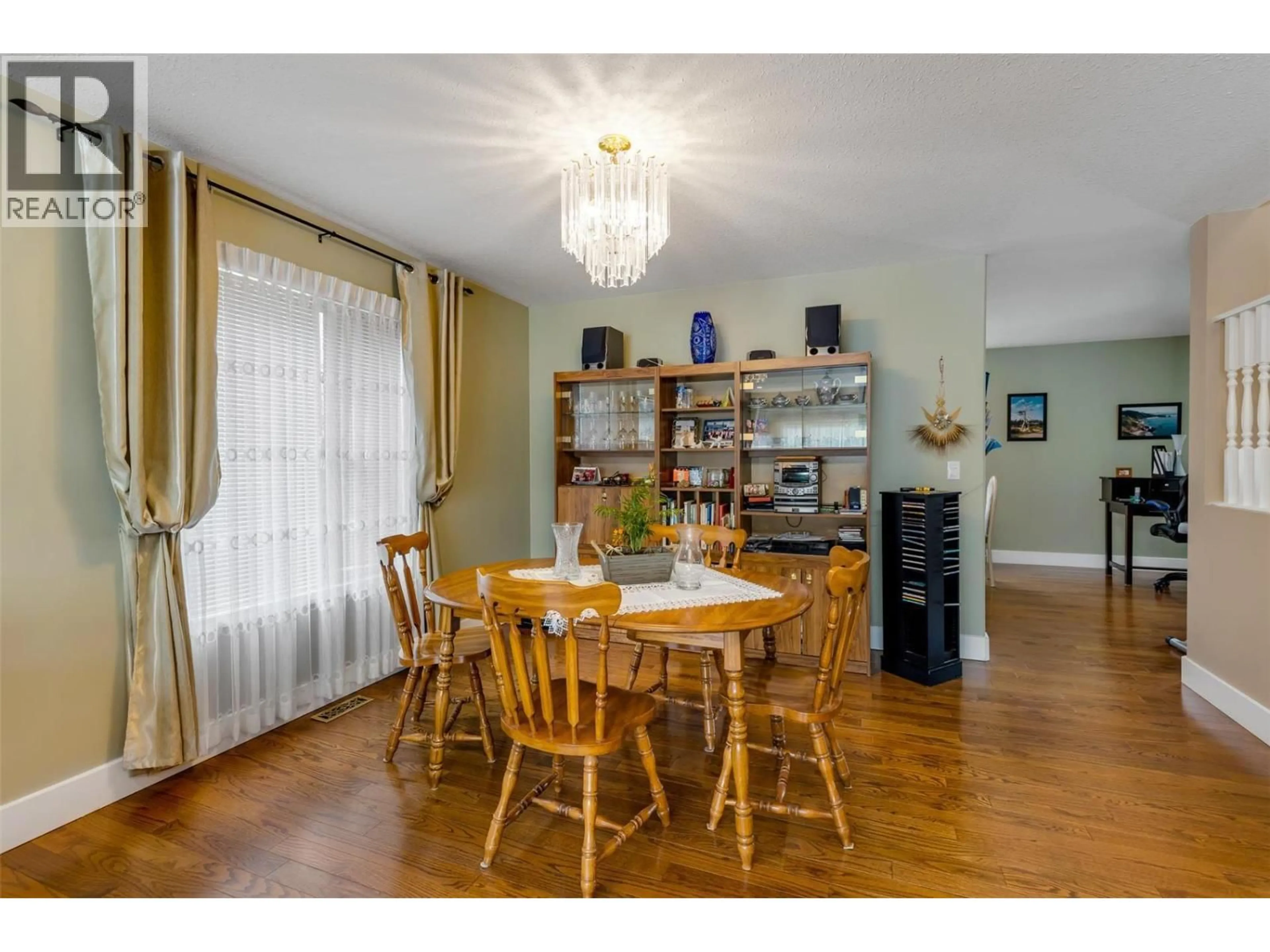Dining room, wood/laminate floor for 5 - 555 GLENMEADOWS ROAD, Kelowna British Columbia V1V1V5