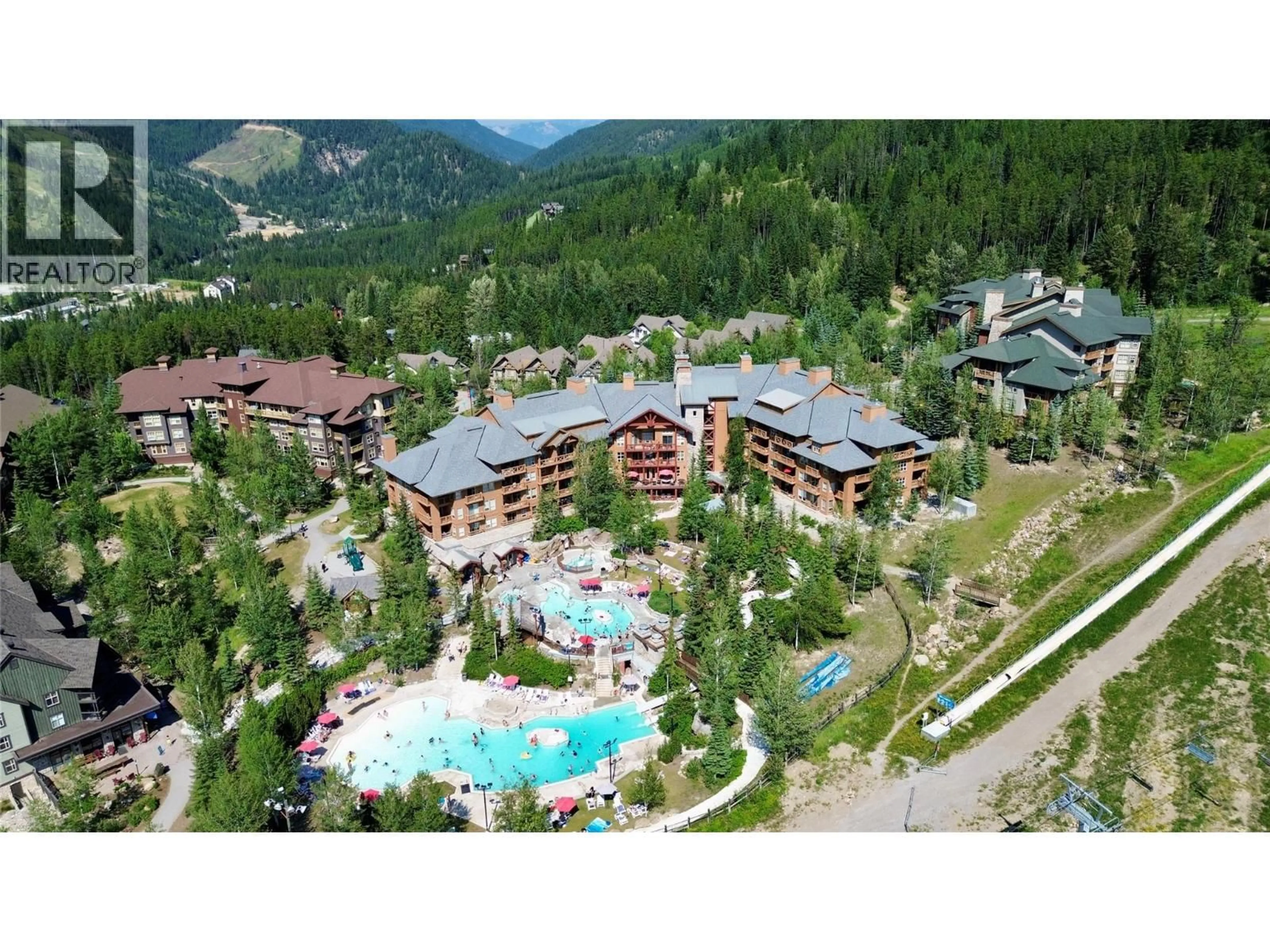 A pic from outside/outdoor area/front of a property/back of a property/a pic from drone, mountain view for 214 - 2080 SUMMIT DRIVE, Panorama British Columbia V0A1T0