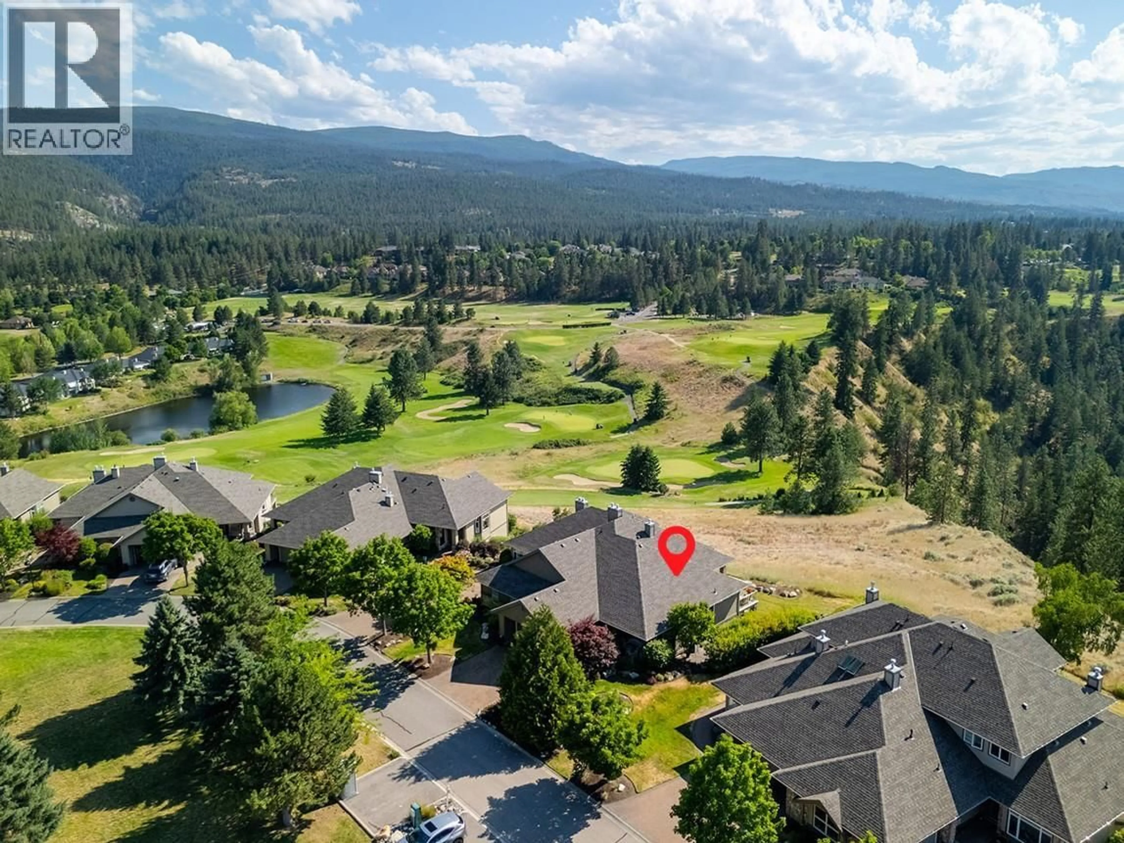 A pic from outside/outdoor area/front of a property/back of a property/a pic from drone, mountain view for 10 - 3800 GALLAGHERS PINNACLE WAY, Kelowna British Columbia V1W3Z8