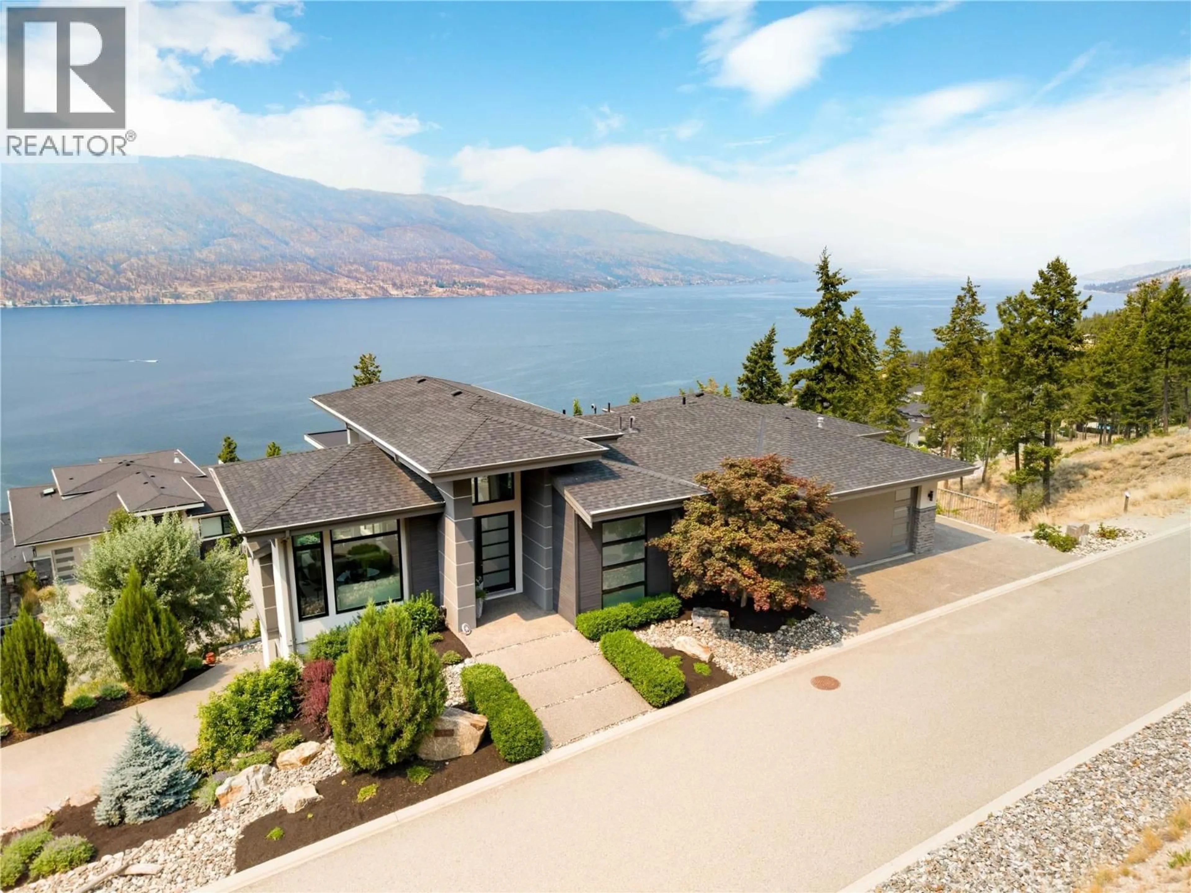 Home with vinyl exterior material, water/lake/river/ocean view for 3320 ACACIA LANE, Kelowna British Columbia V1V3G1