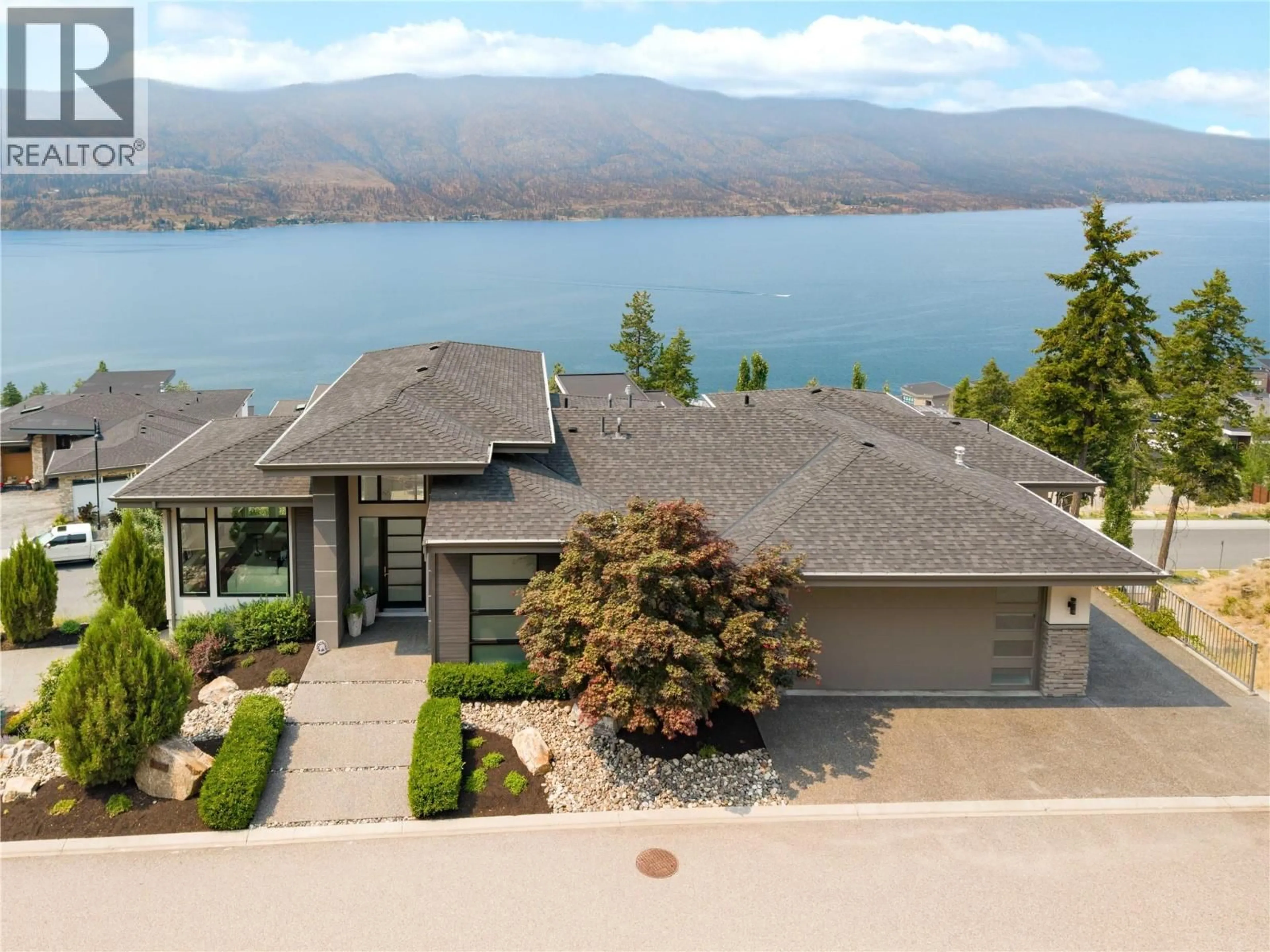 A pic from outside/outdoor area/front of a property/back of a property/a pic from drone, water/lake/river/ocean view for 3320 ACACIA LANE, Kelowna British Columbia V1V3G1