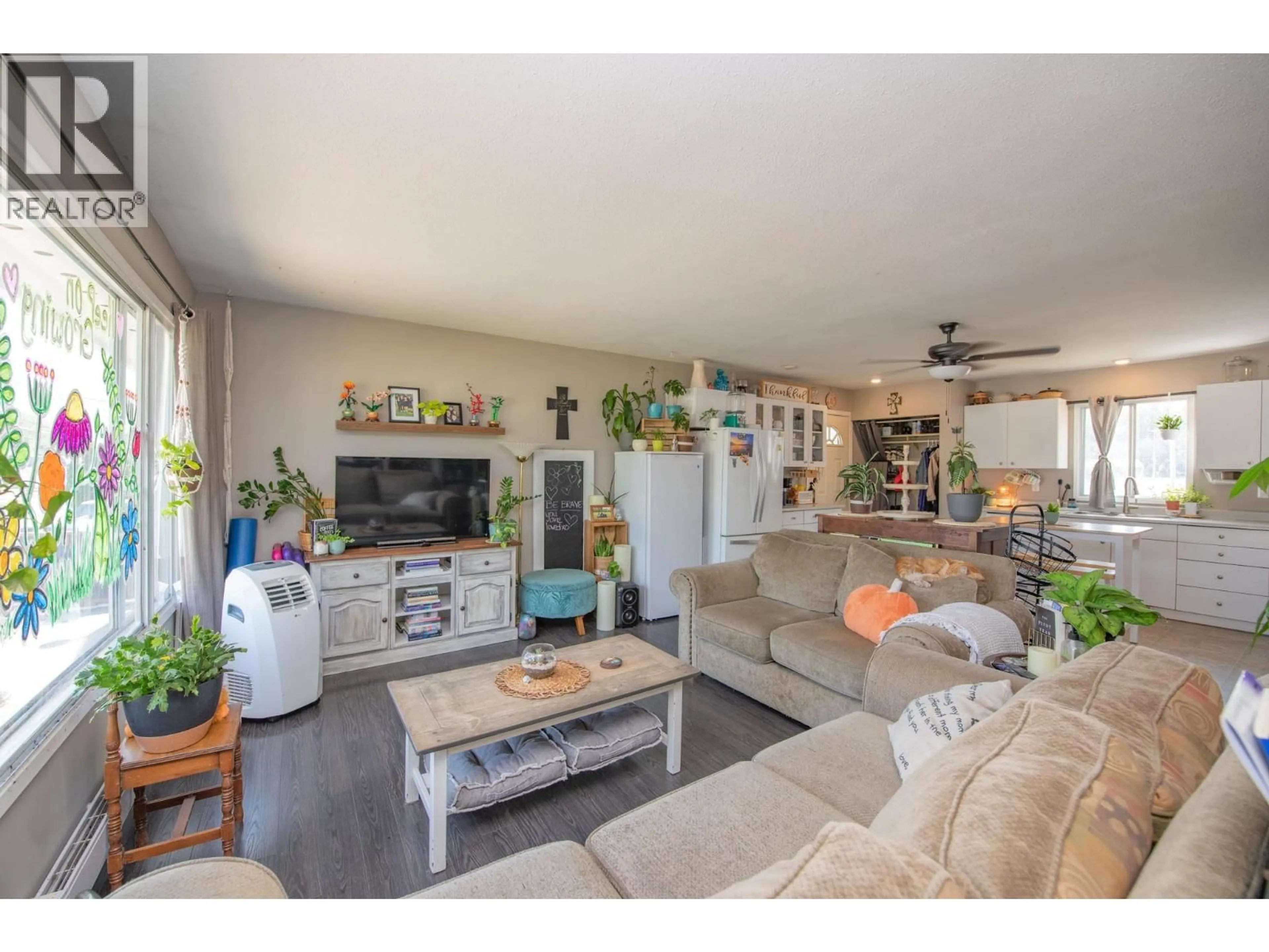 Living room with furniture, wood/laminate floor for 3313 BELAIRE DRIVE, Armstrong British Columbia V0E1B0