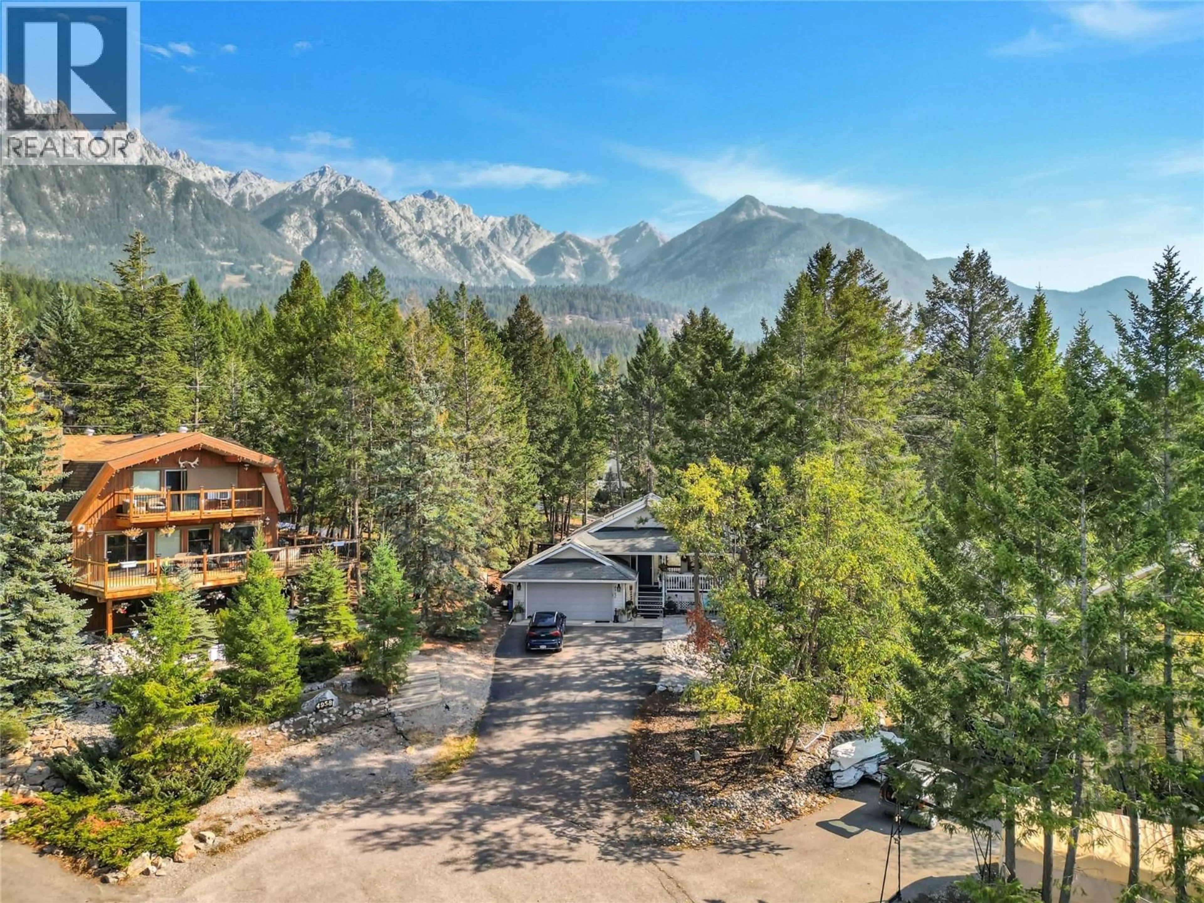 A pic from outside/outdoor area/front of a property/back of a property/a pic from drone, mountain view for 4962 MOUNTAIN SIDE PLACE, Fairmont Hot Springs British Columbia V0B1L1