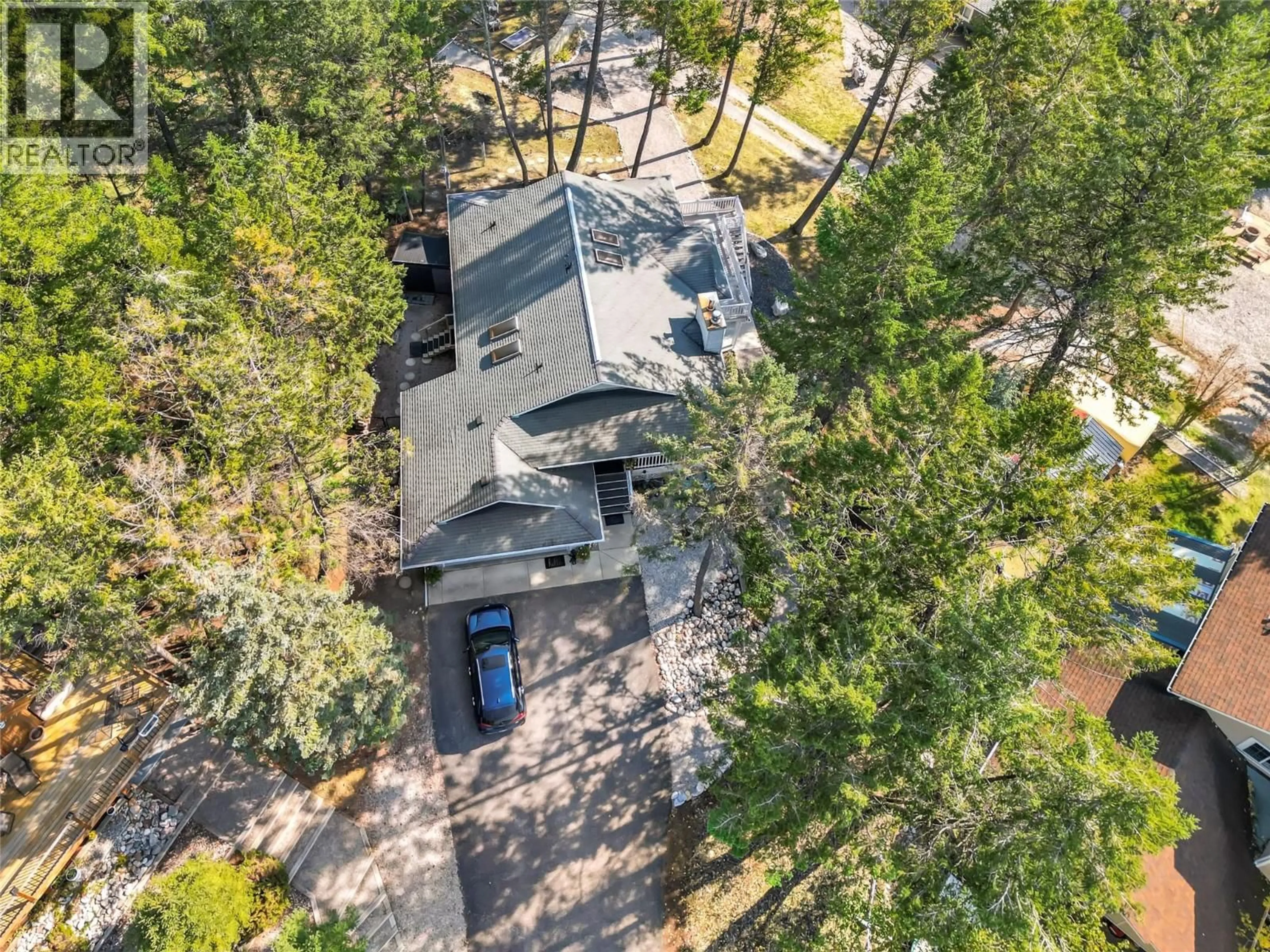 A pic from outside/outdoor area/front of a property/back of a property/a pic from drone, forest/trees view for 4962 MOUNTAIN SIDE PLACE, Fairmont Hot Springs British Columbia V0B1L1
