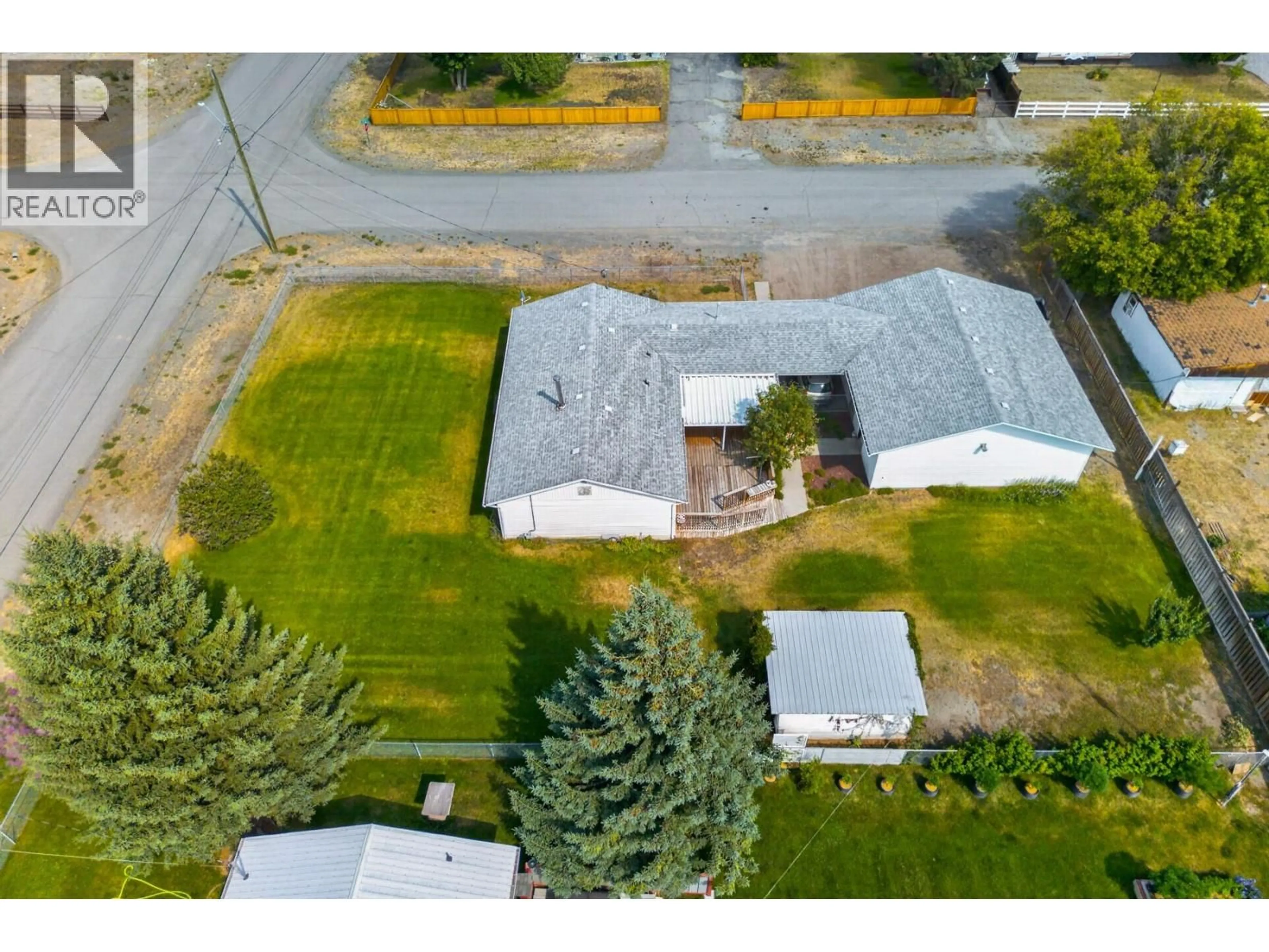 A pic from outside/outdoor area/front of a property/back of a property/a pic from drone, unknown for 448 WOODWARD AVENUE, Merritt British Columbia V0K1Y0