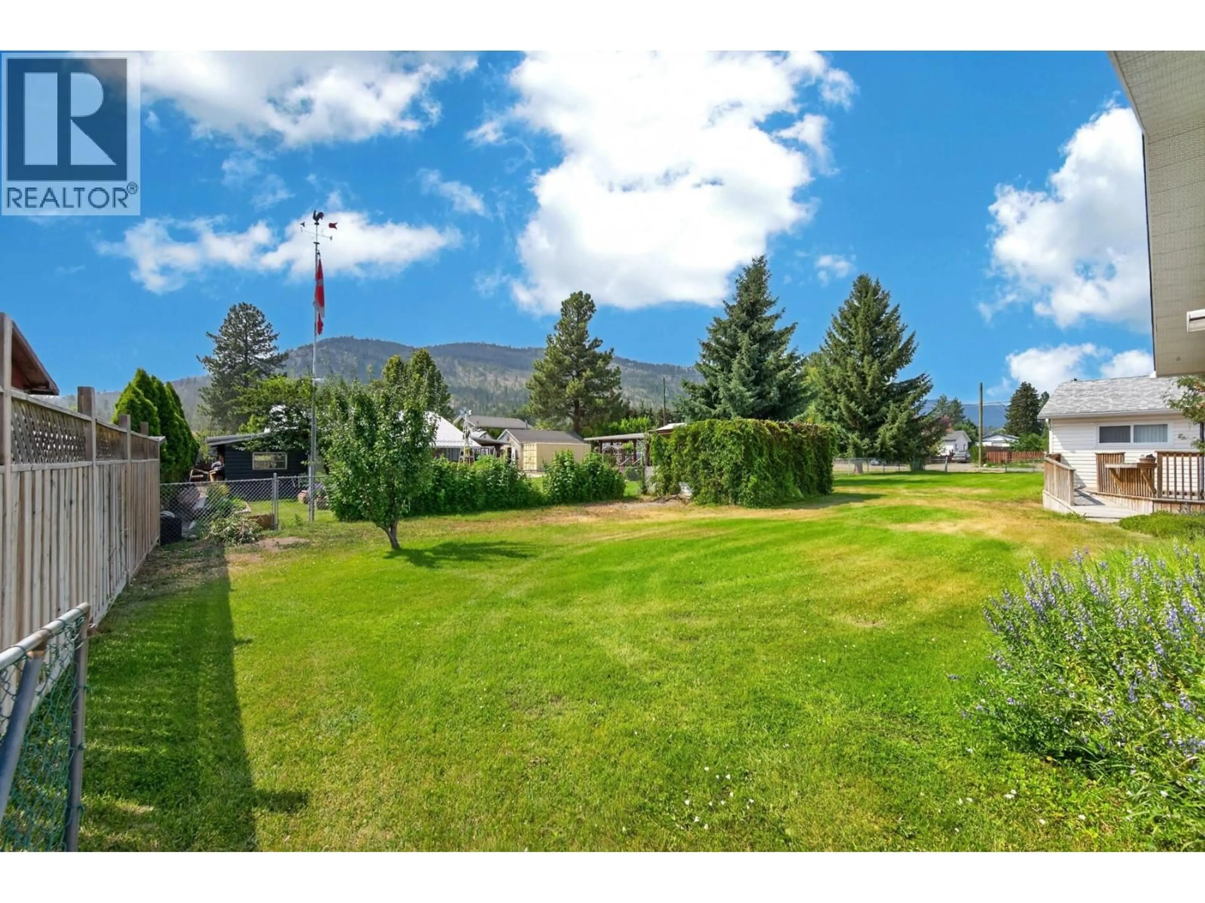 A pic from outside/outdoor area/front of a property/back of a property/a pic from drone, mountain view for 448 WOODWARD AVENUE, Merritt British Columbia V0K1Y0
